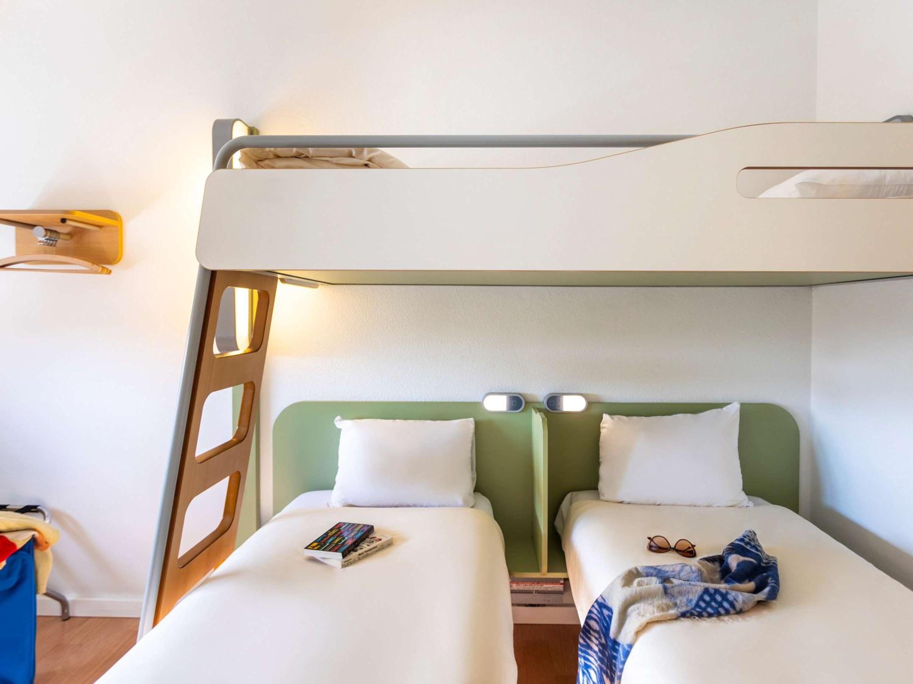 Standard Double Room with Two Single Beds and One Bunk Bed - Photo 7
