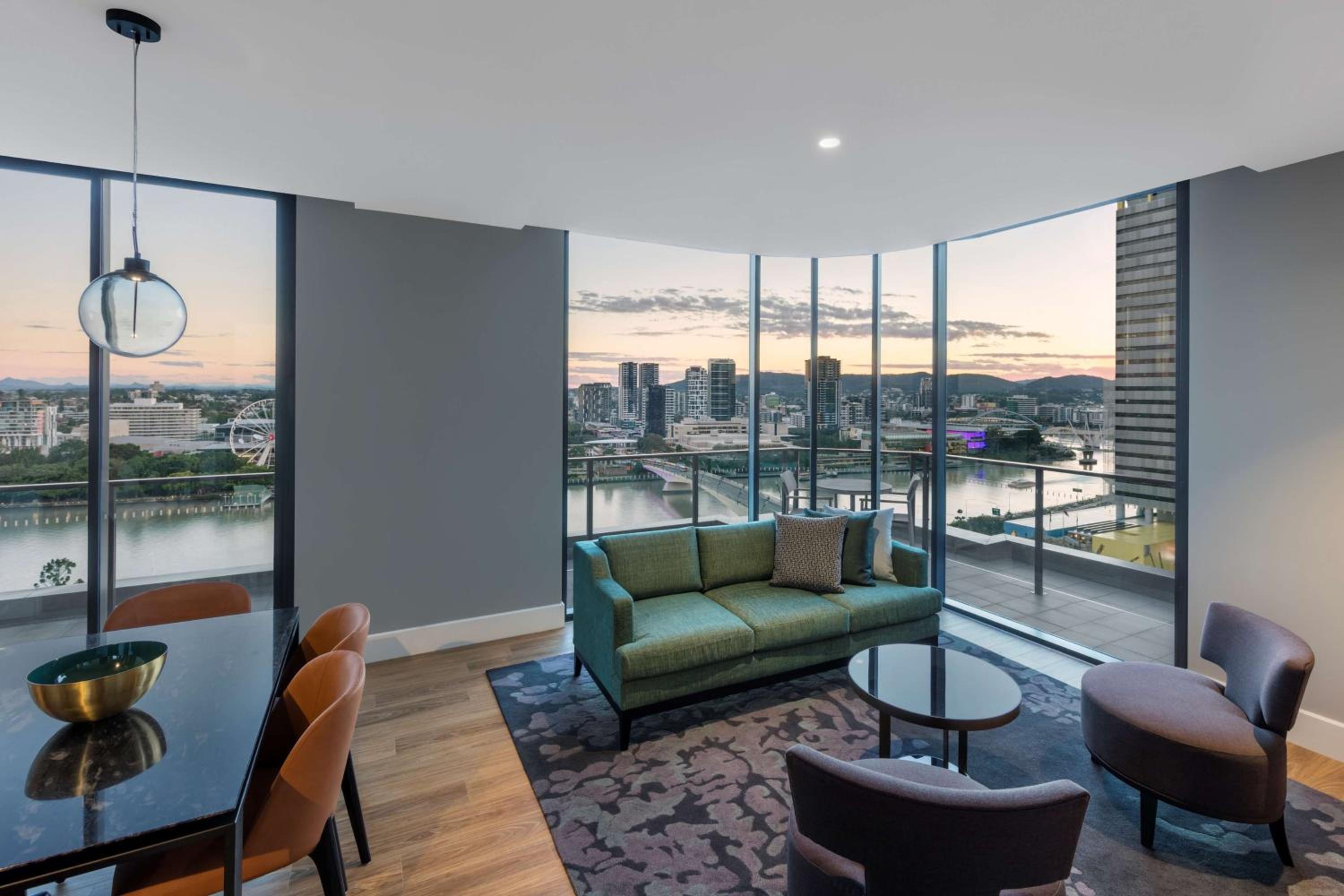 Three-Bedroom Penthouse Apartment with Balcony and River View