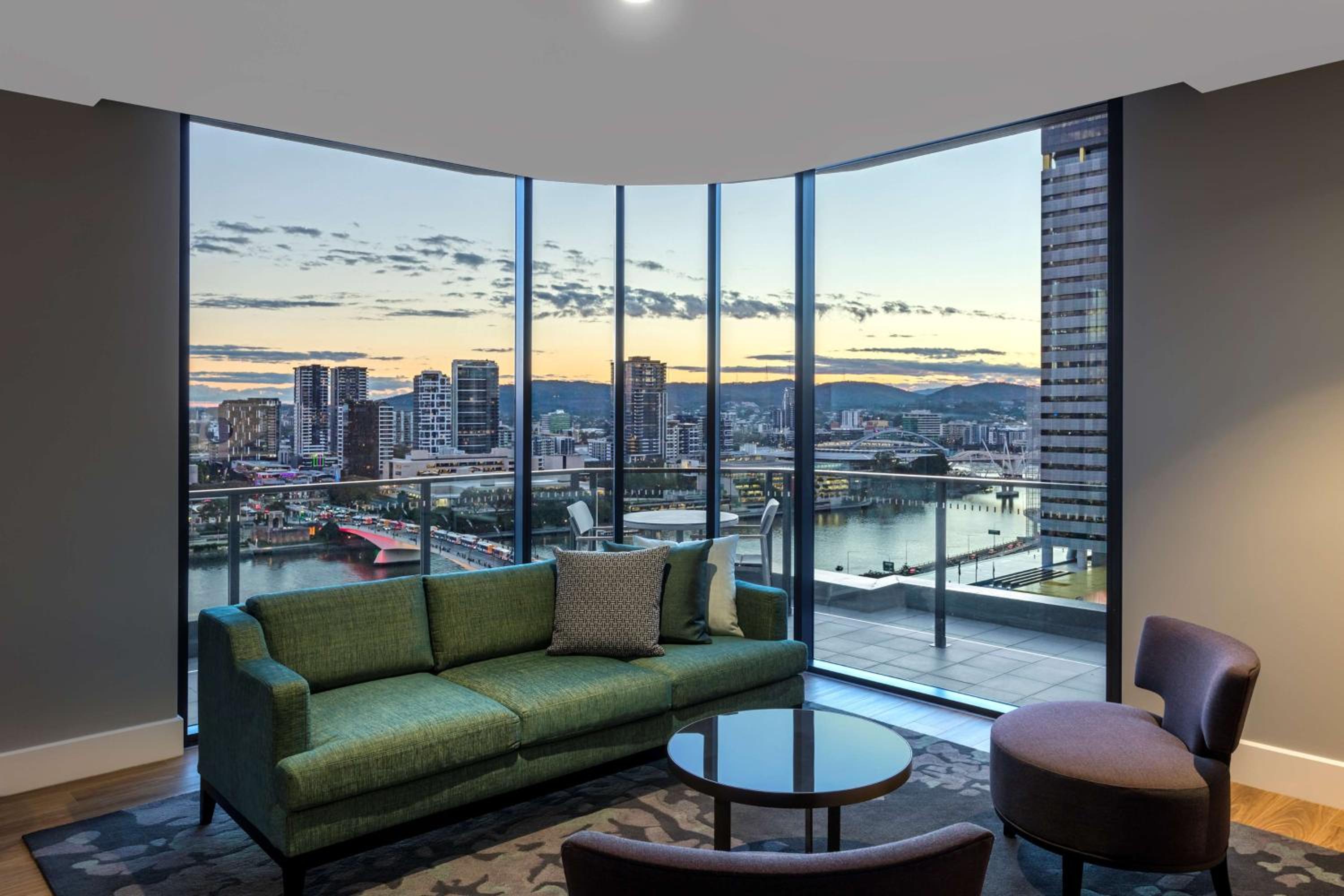 Three-Bedroom Penthouse Apartment with Balcony and River View