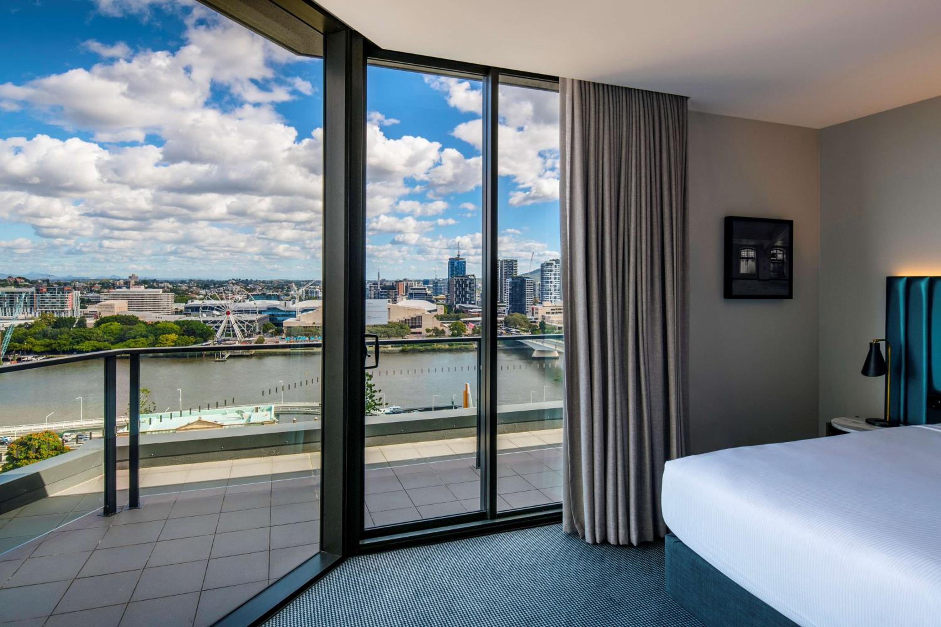 Three-Bedroom Penthouse Apartment with Balcony and River View