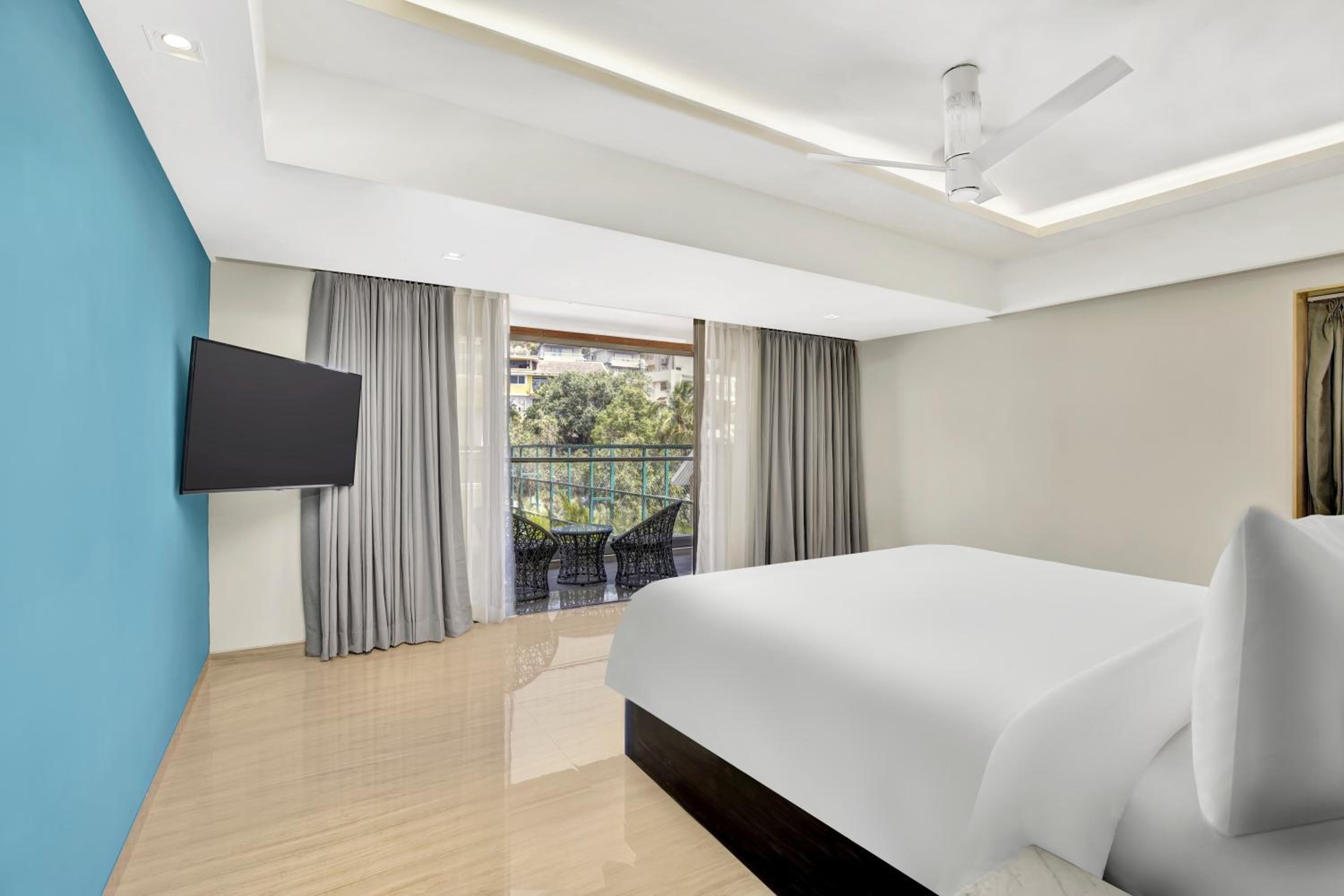 Junior Suite Pool View and Balcony - Food credit of INR 1000 once per stay, 20% discount on Food & Beverage, Spa & Laundry+ flexible Check-in & Check-out