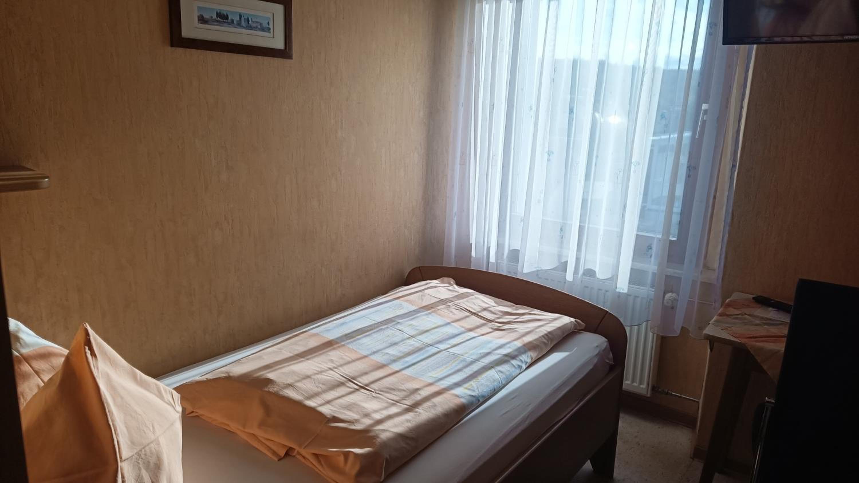 Single Room with Shared Shower and Toilet