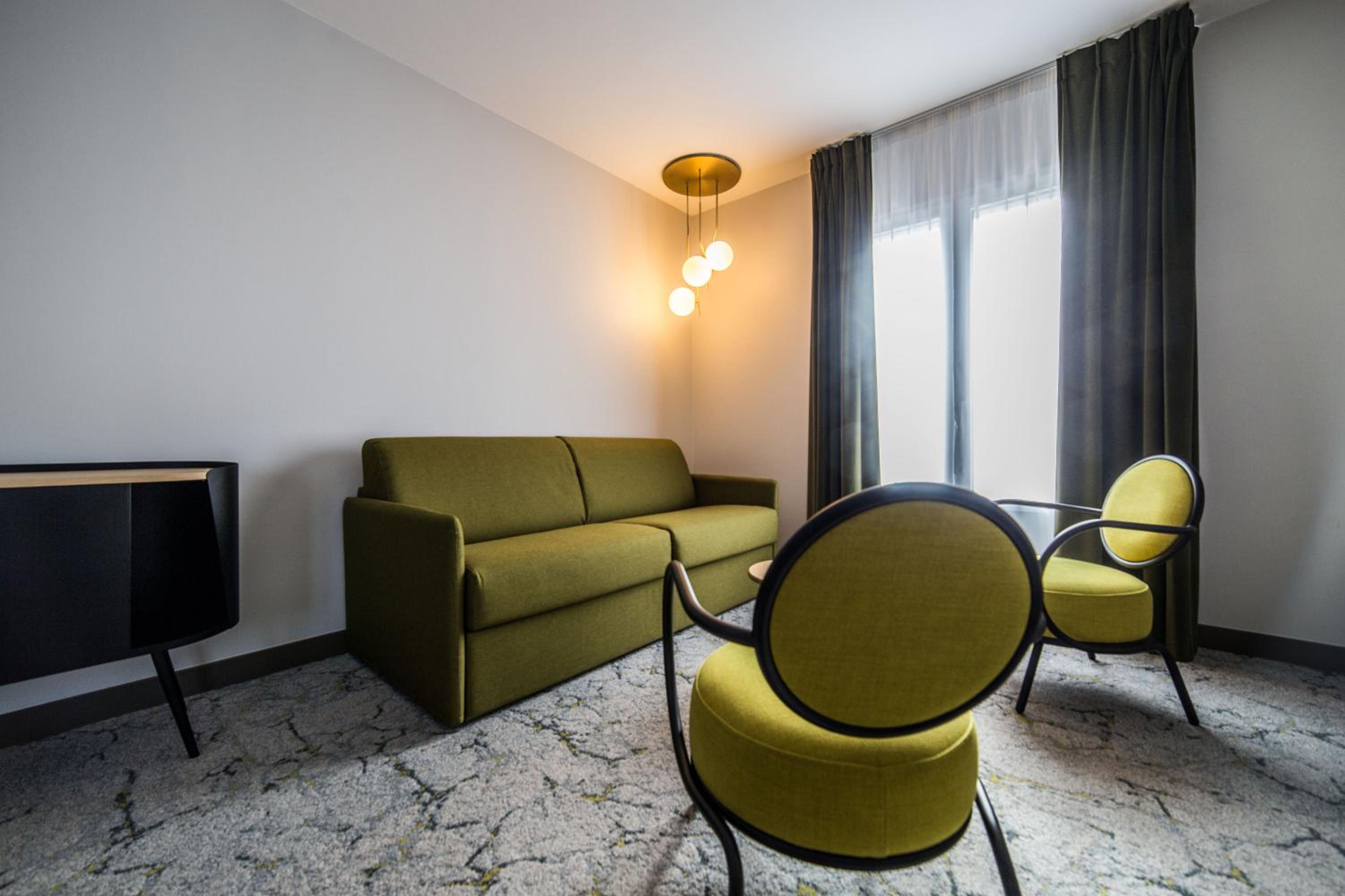 King Suite with Sofa Bed - Non-Smoking - Photo 1