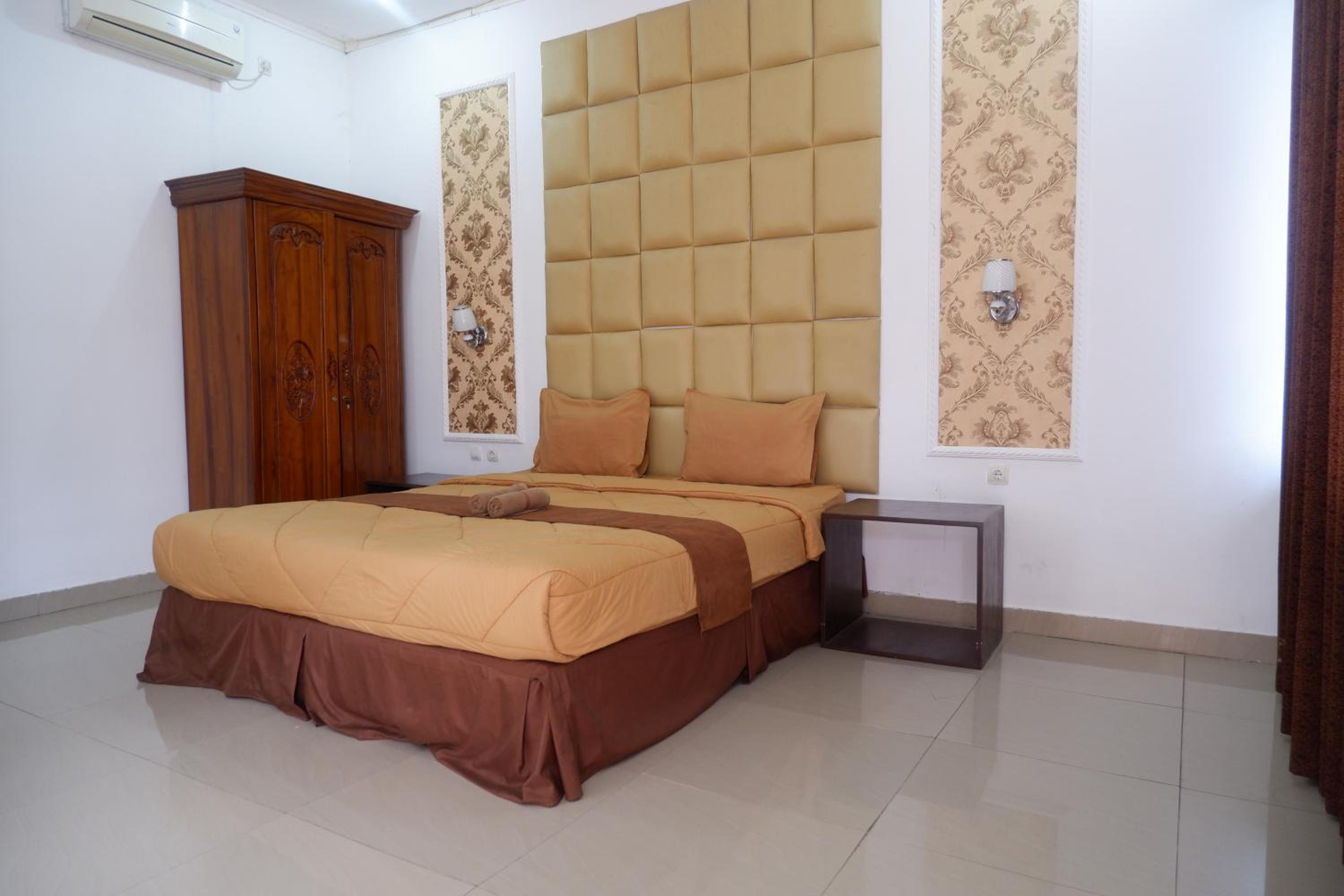 Deluxe Room - Photo 1