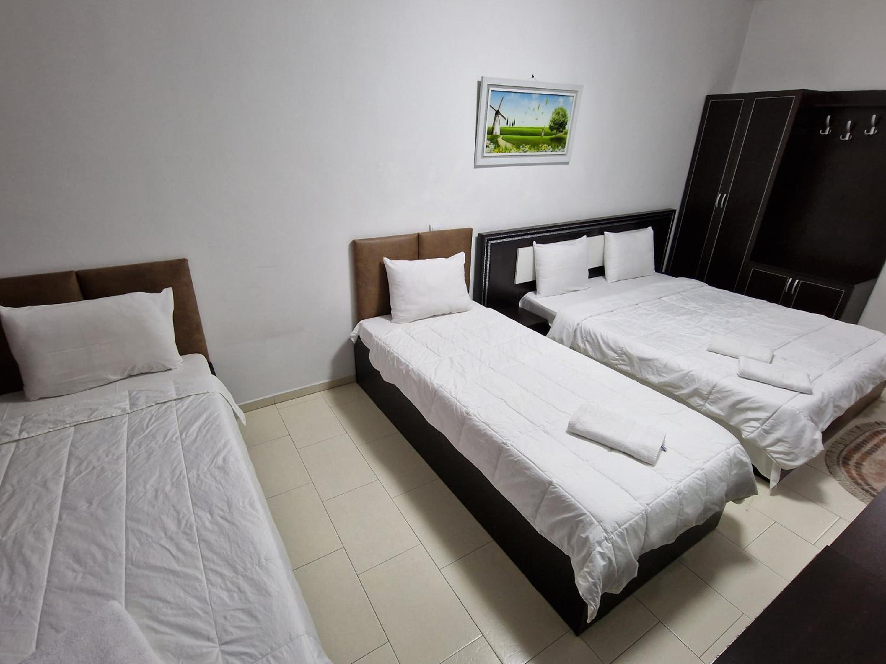 Quadruple Room with Private Bathroom photo 3