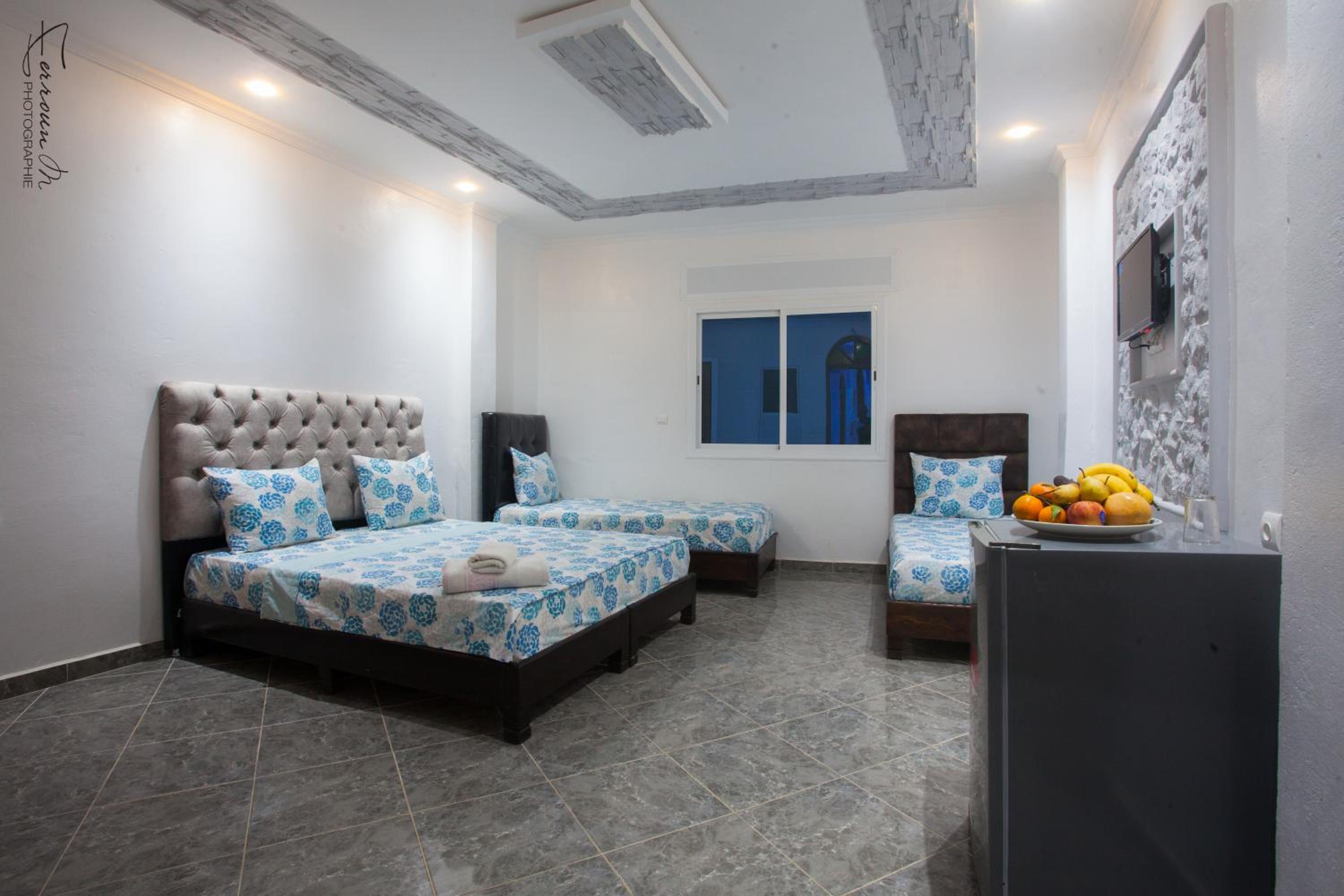 Quadruple Room with Shower - Photo 18