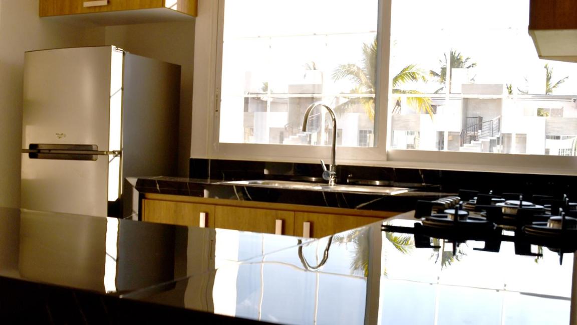 Three-Bedroom Apartment - Photo 32