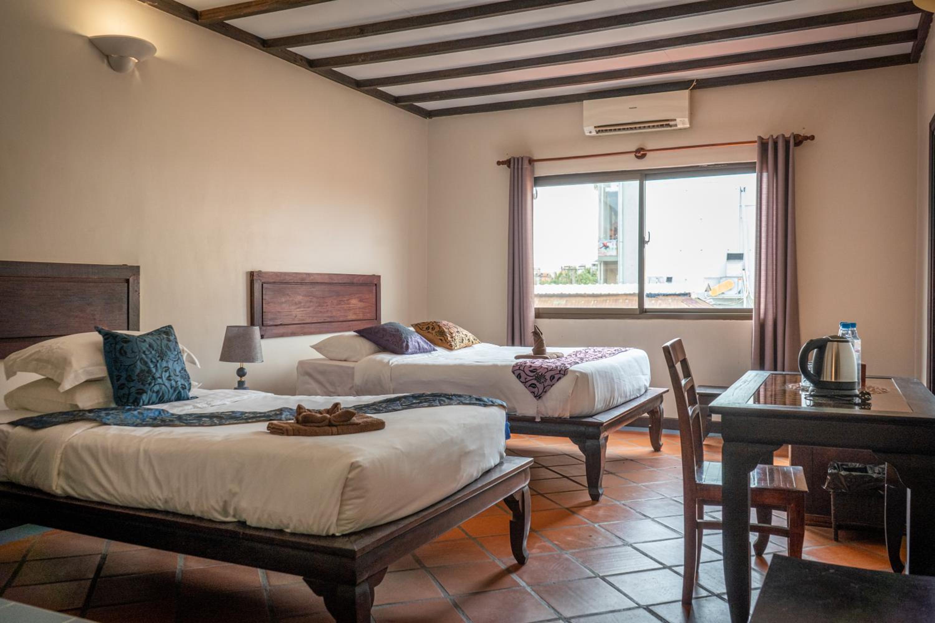 Standard Twin Room - Photo 1