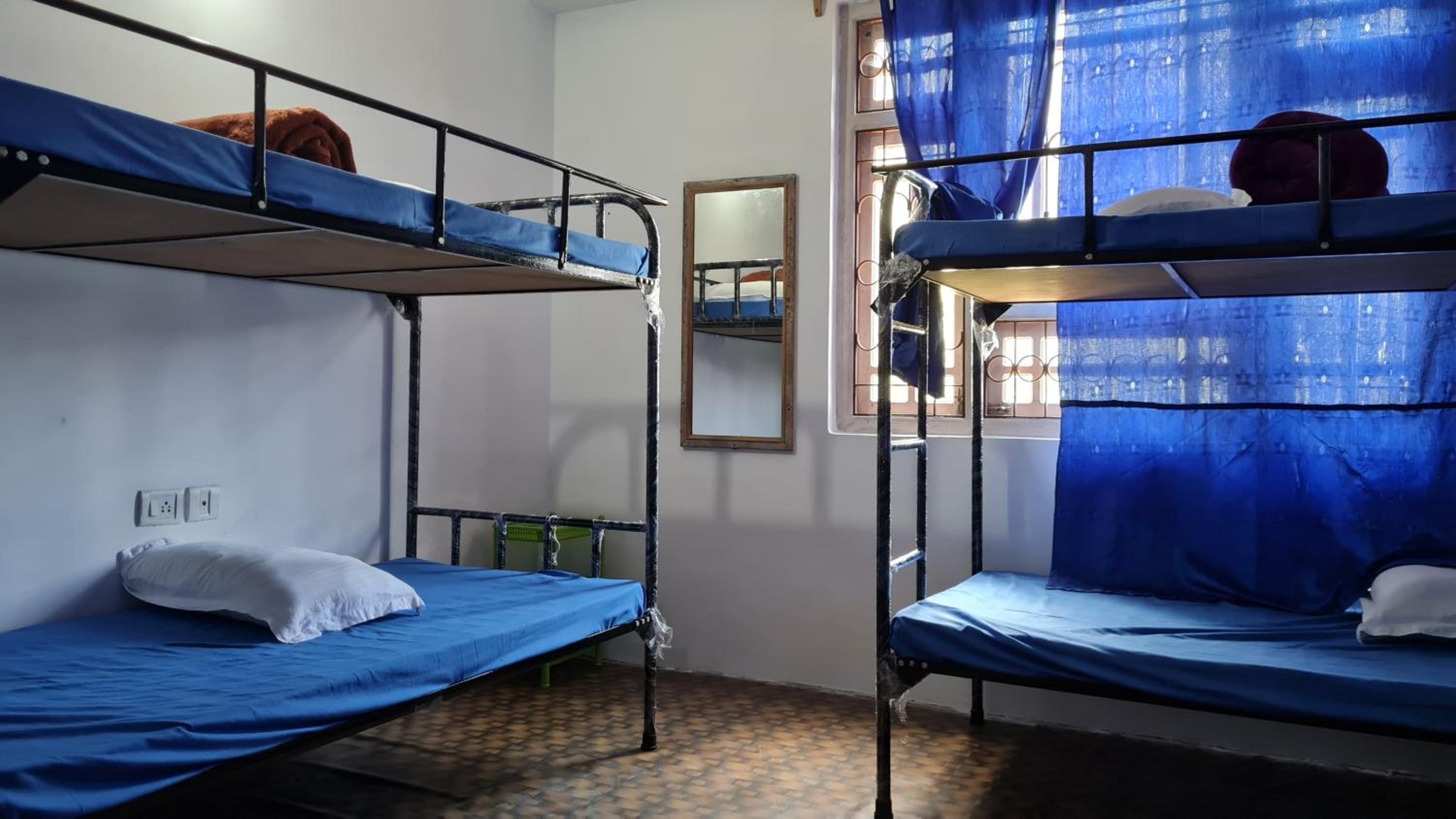 Single Bed in Dormitory Room