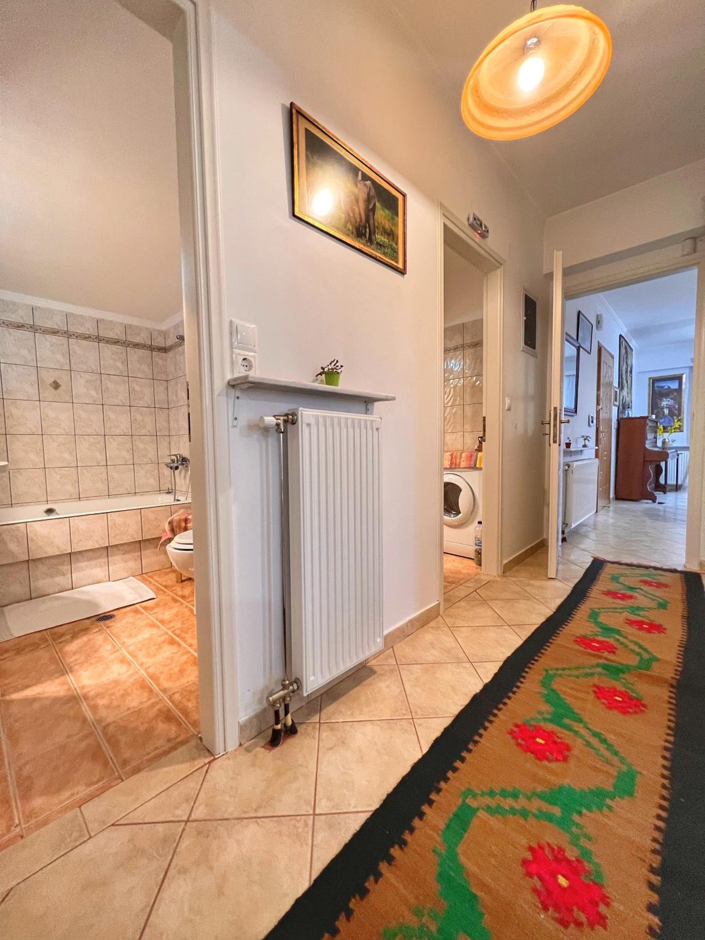 Three-Bedroom Apartment - Photo 23