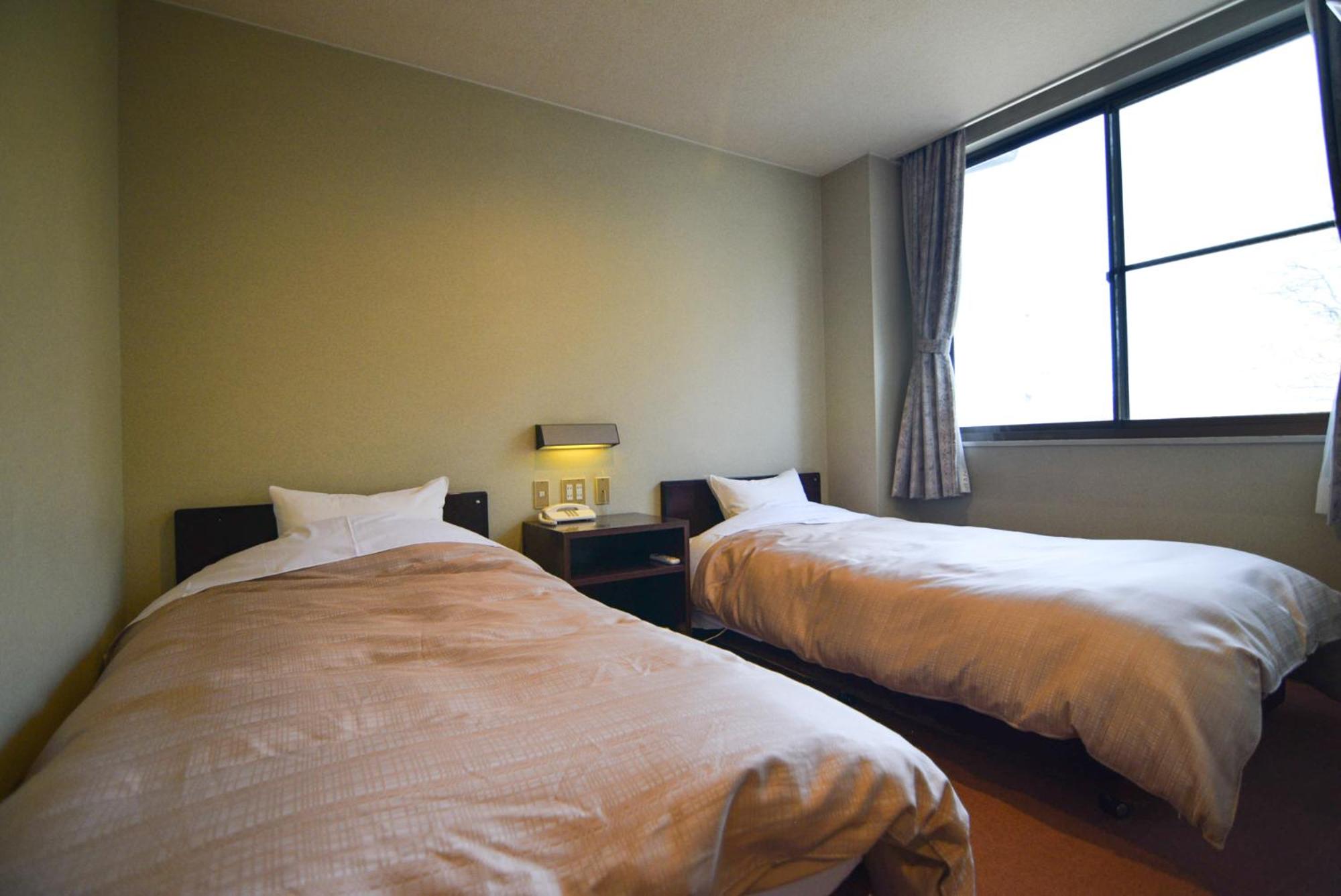 Twin Room with Tatami Area - Non-Smoking photo 3