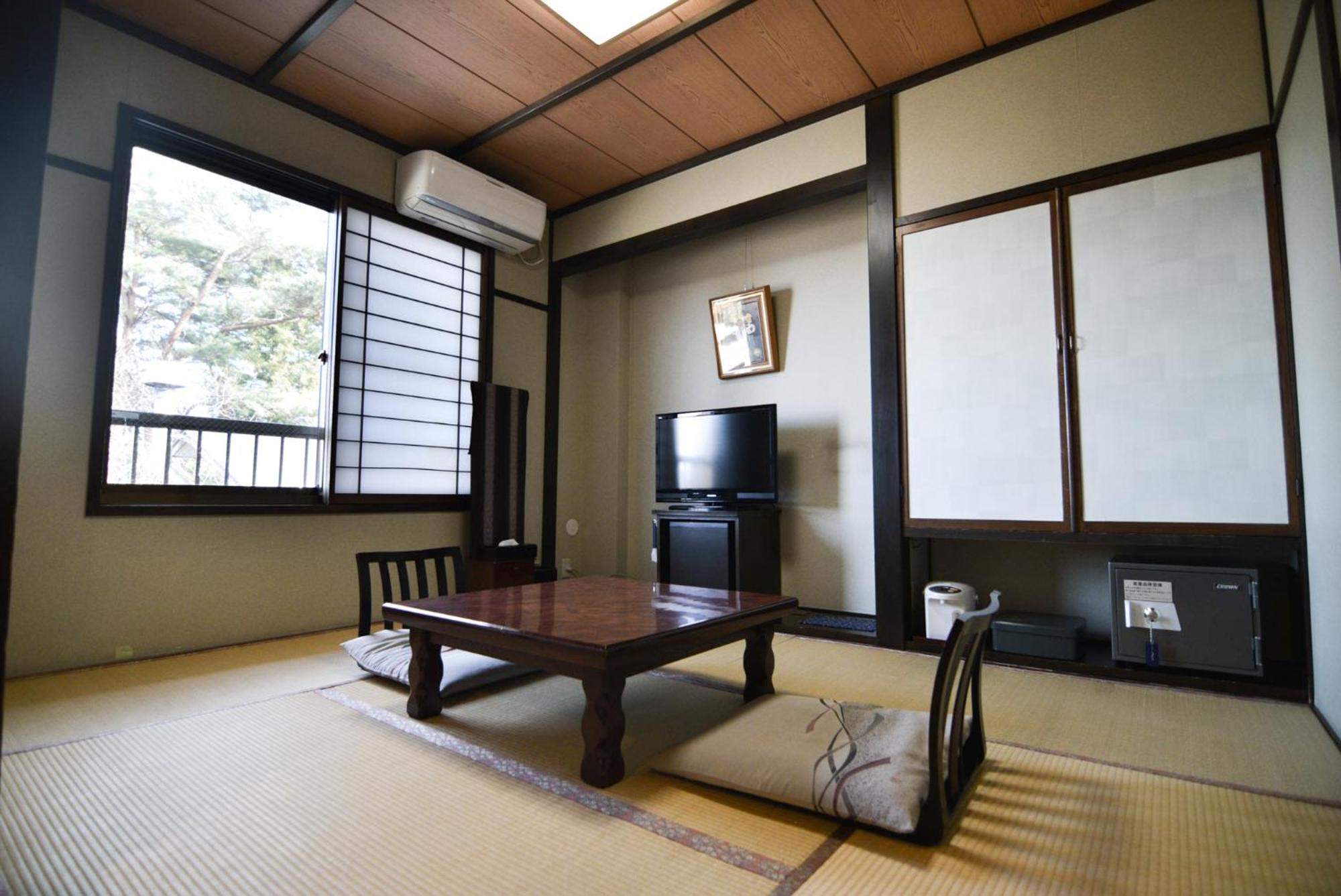 Twin Room with Tatami Area - Non-Smoking photo 2