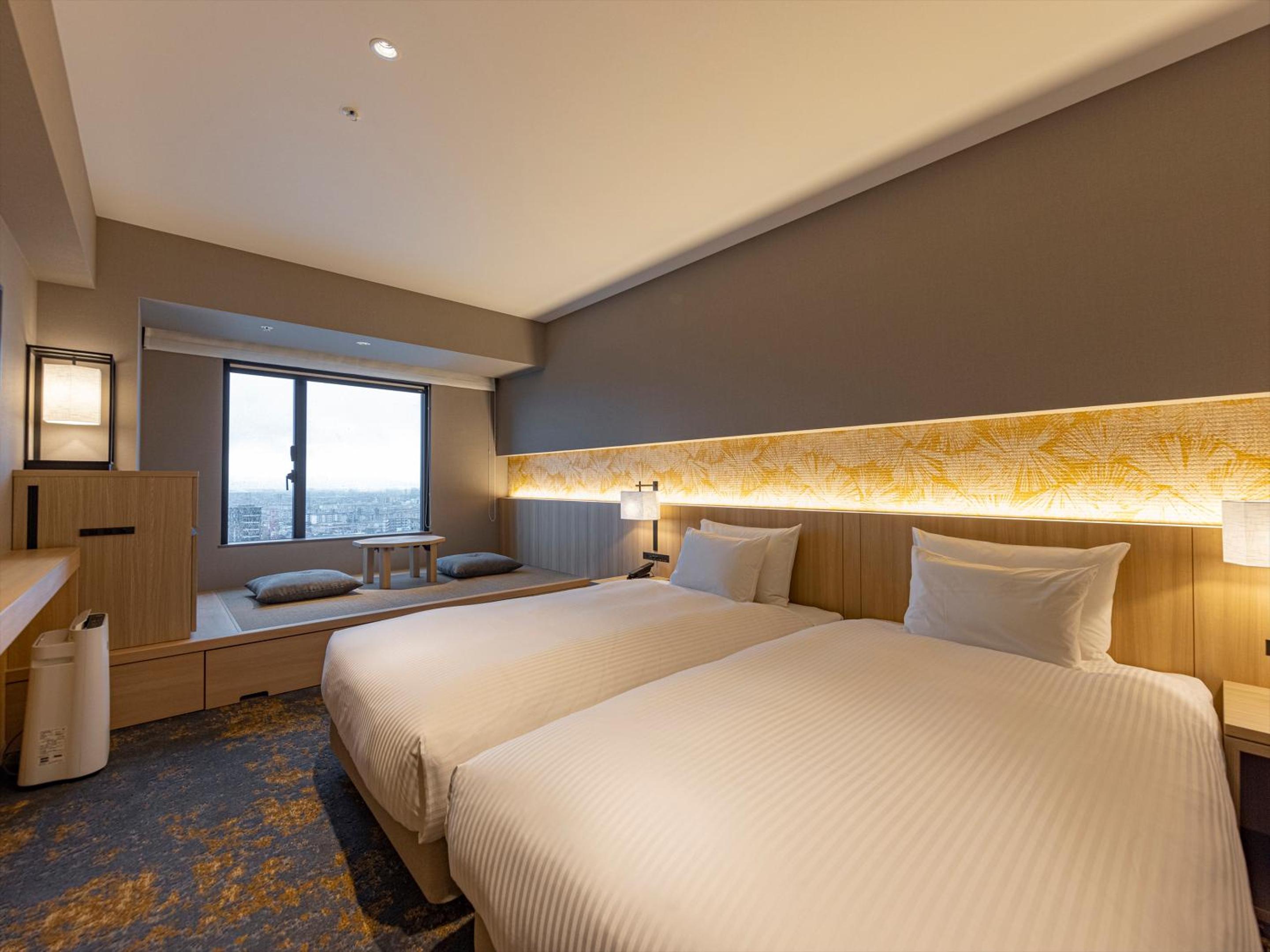 Deluxe Twin Room with Tatami Space (2 Adults) - Non-Smoking  - Photo 1