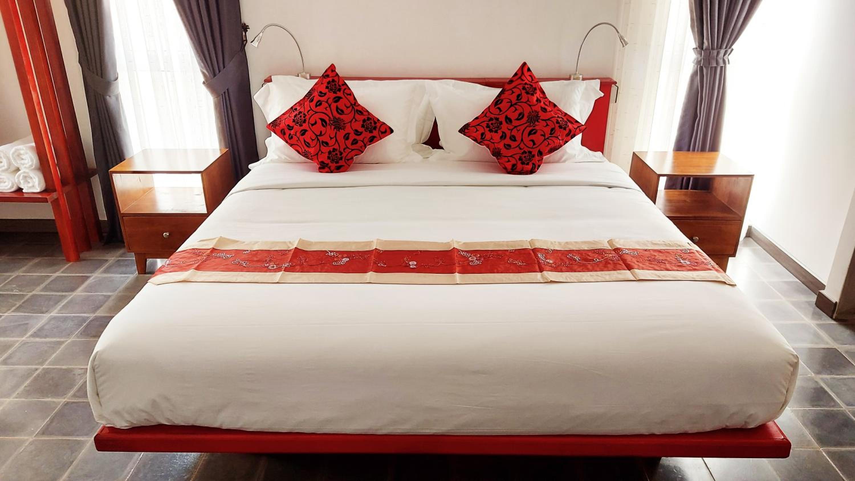 Deluxe Quadruple Room - Photo 7