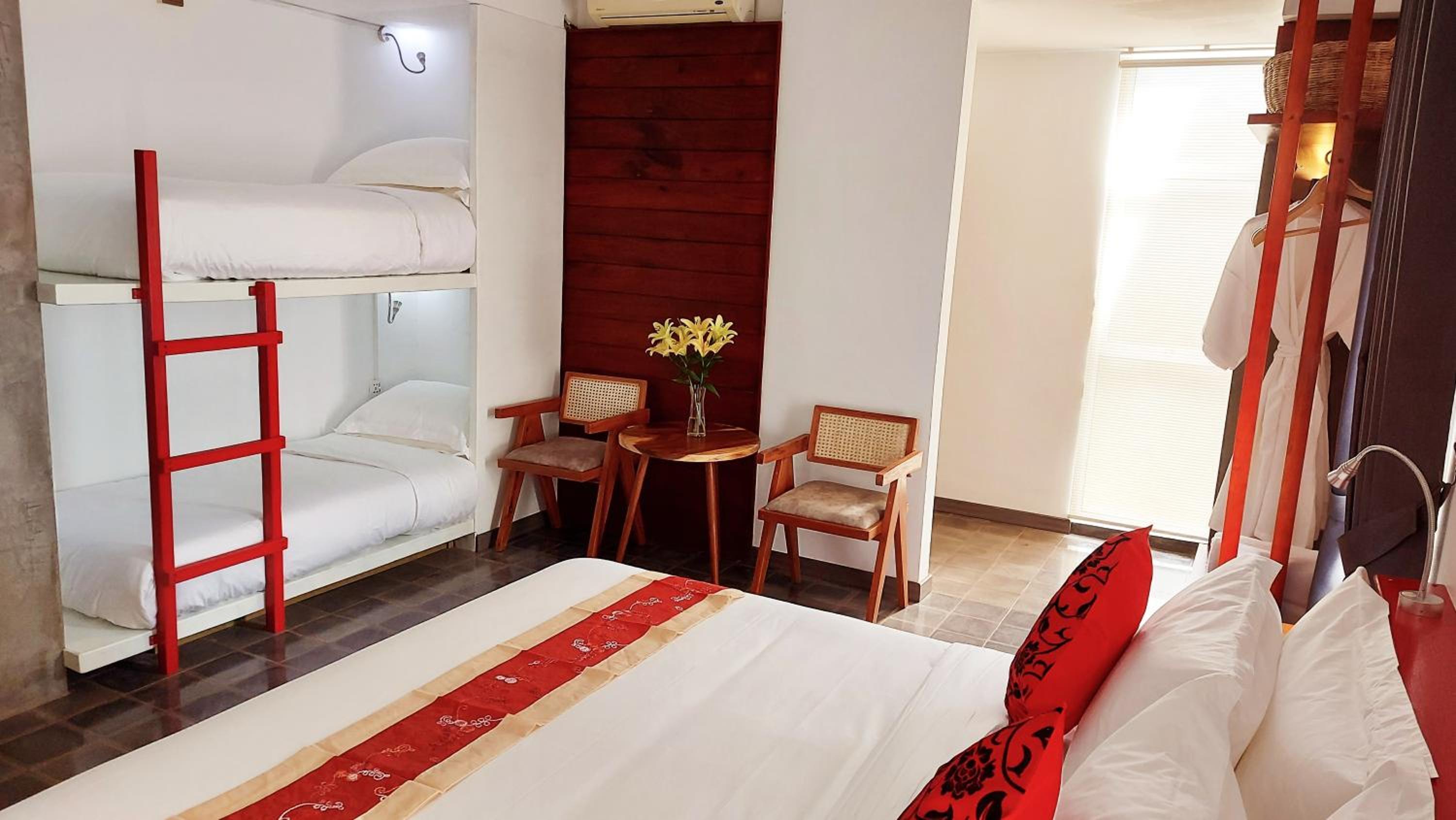 Deluxe Quadruple Room - Photo 8
