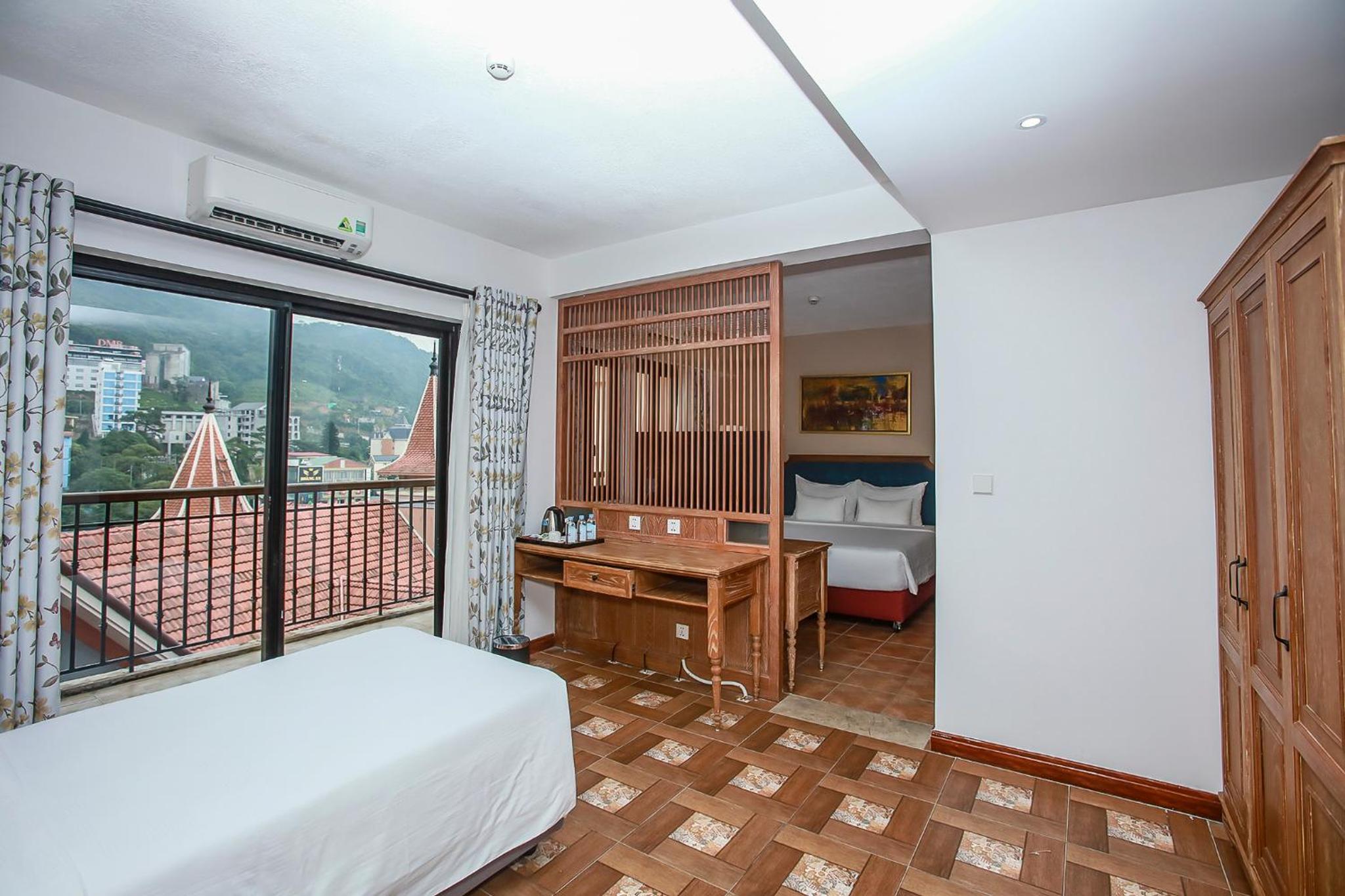 Deluxe Triple Room - Photo 1