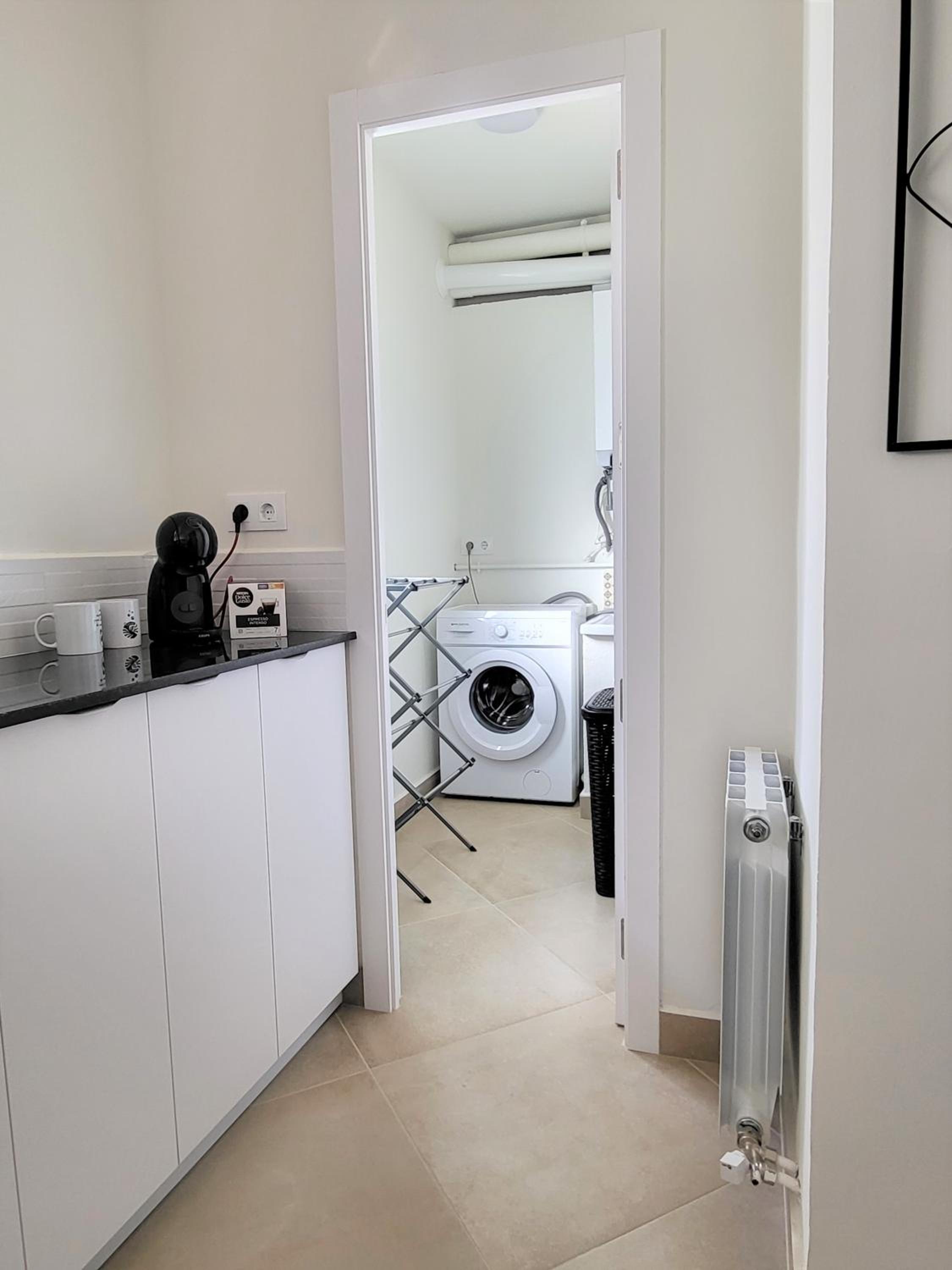 Three-Bedroom Apartment photo 2
