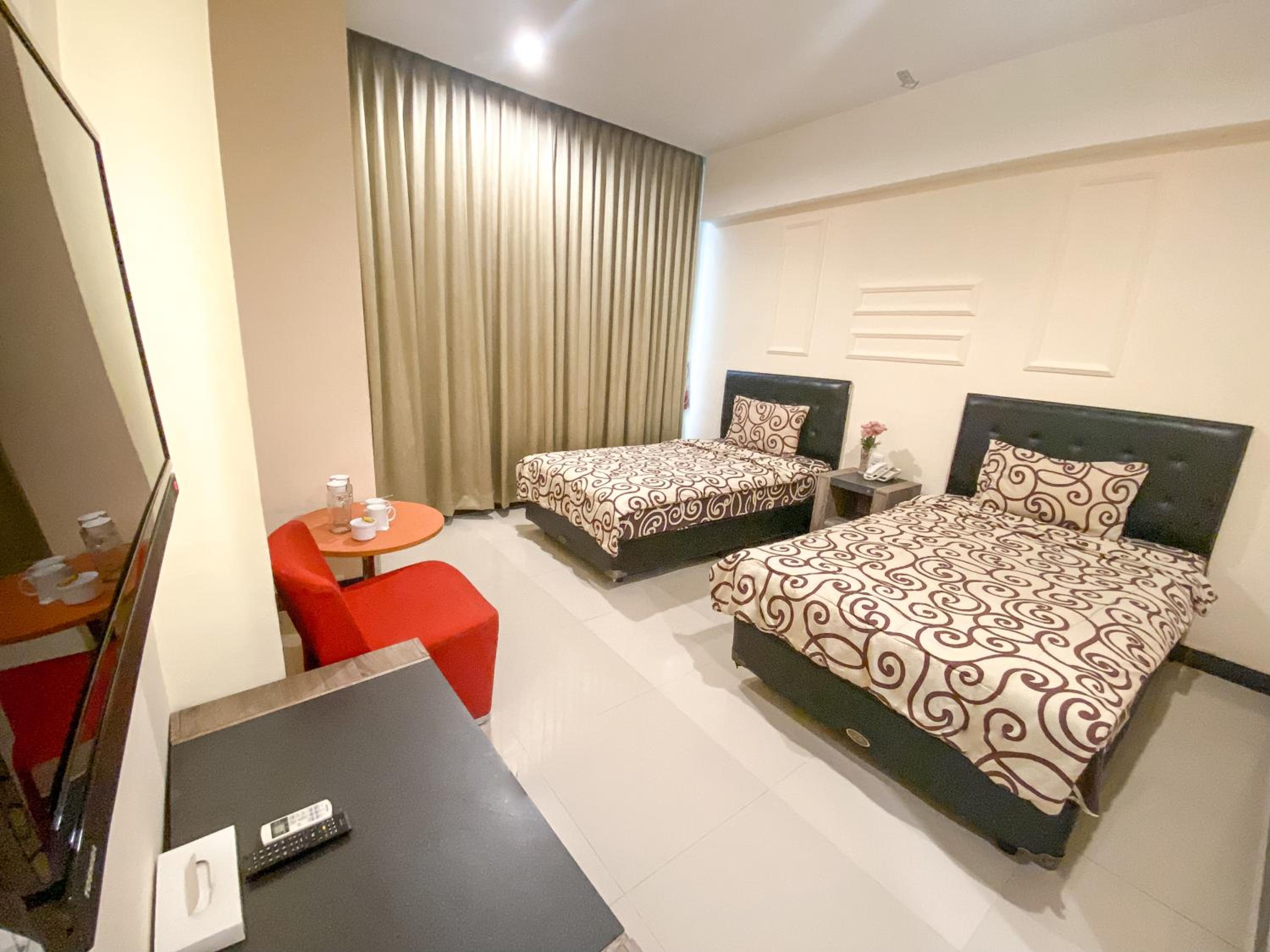 Delxue Twin Room - Photo 14