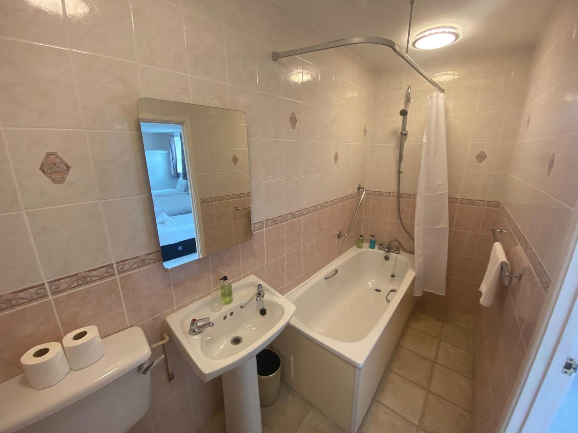 Family Room with Bathroom - Photo 4
