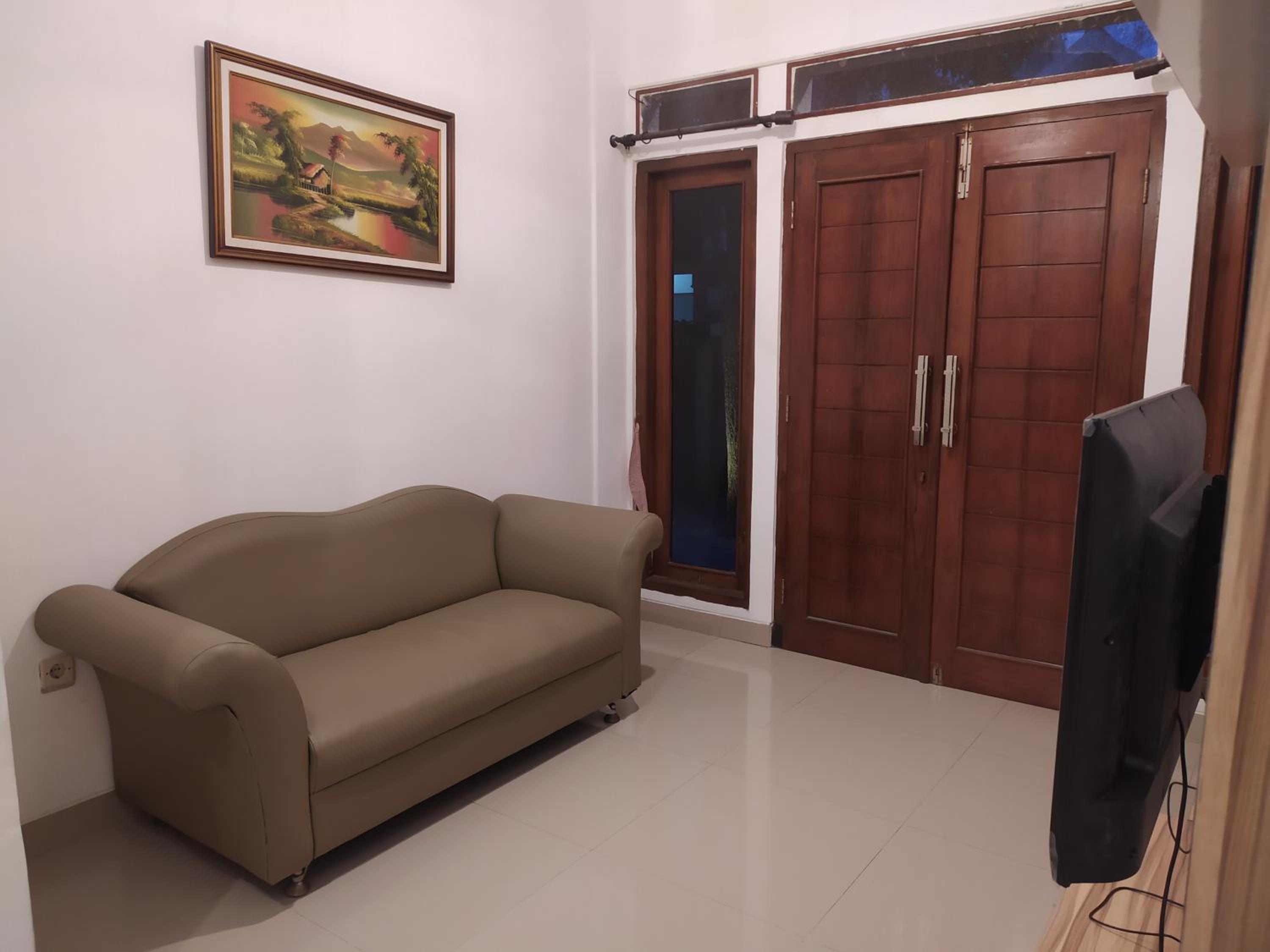 Four-Bedroom House - Photo 19