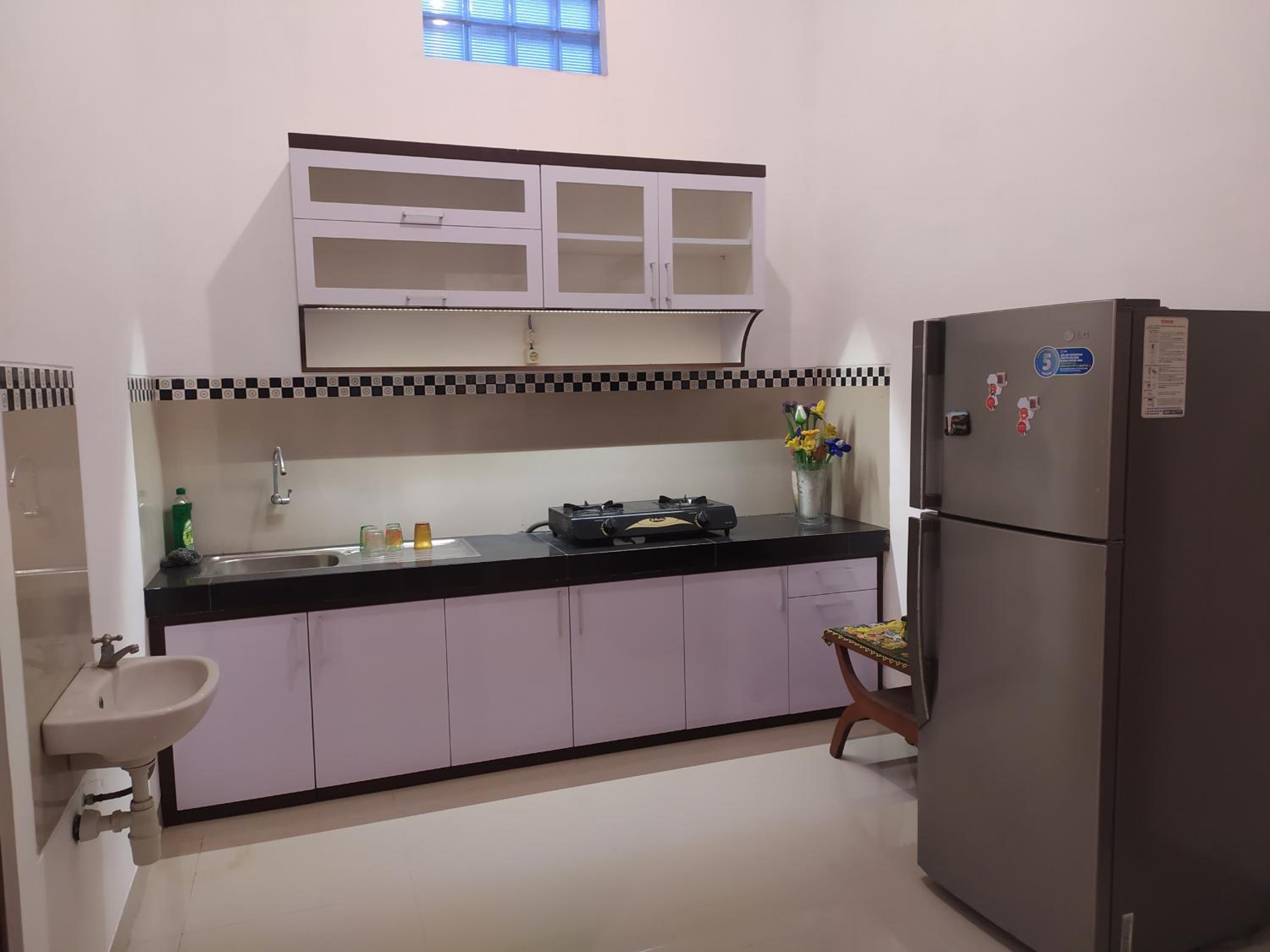 Four-Bedroom House - Photo 17