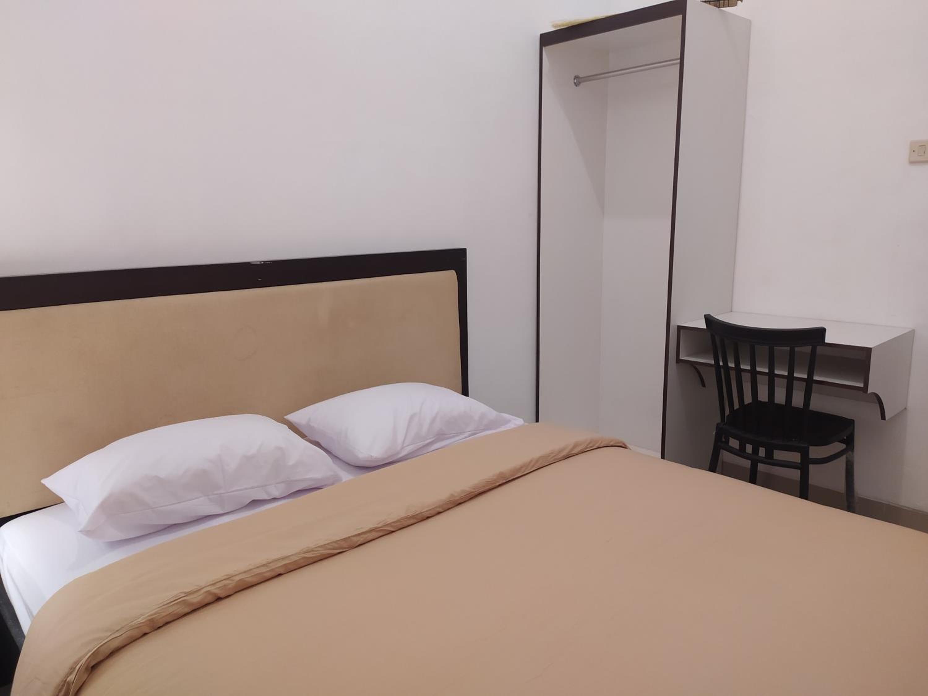 Four-Bedroom House - Photo 14