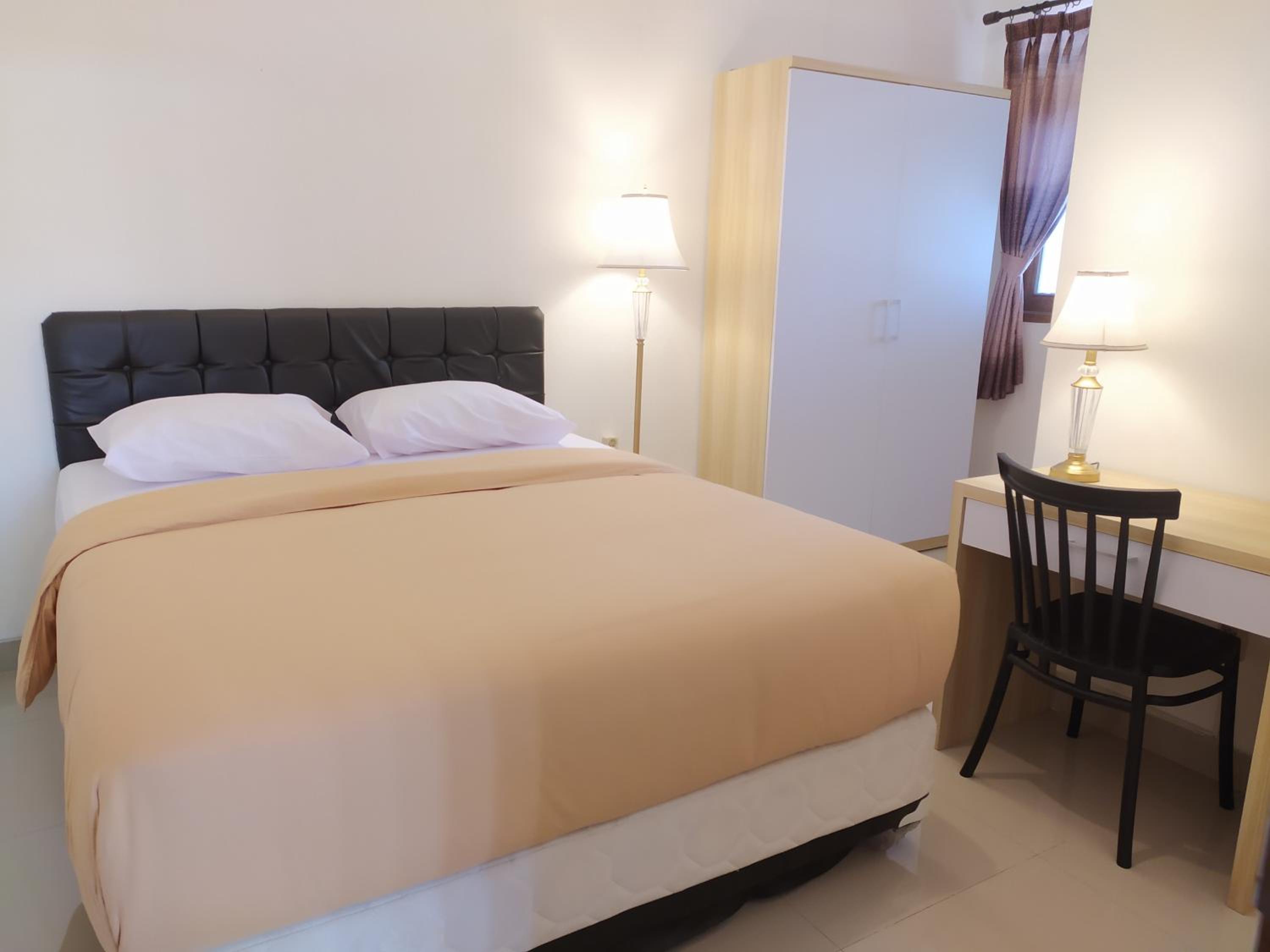 Four-Bedroom House - Photo 5