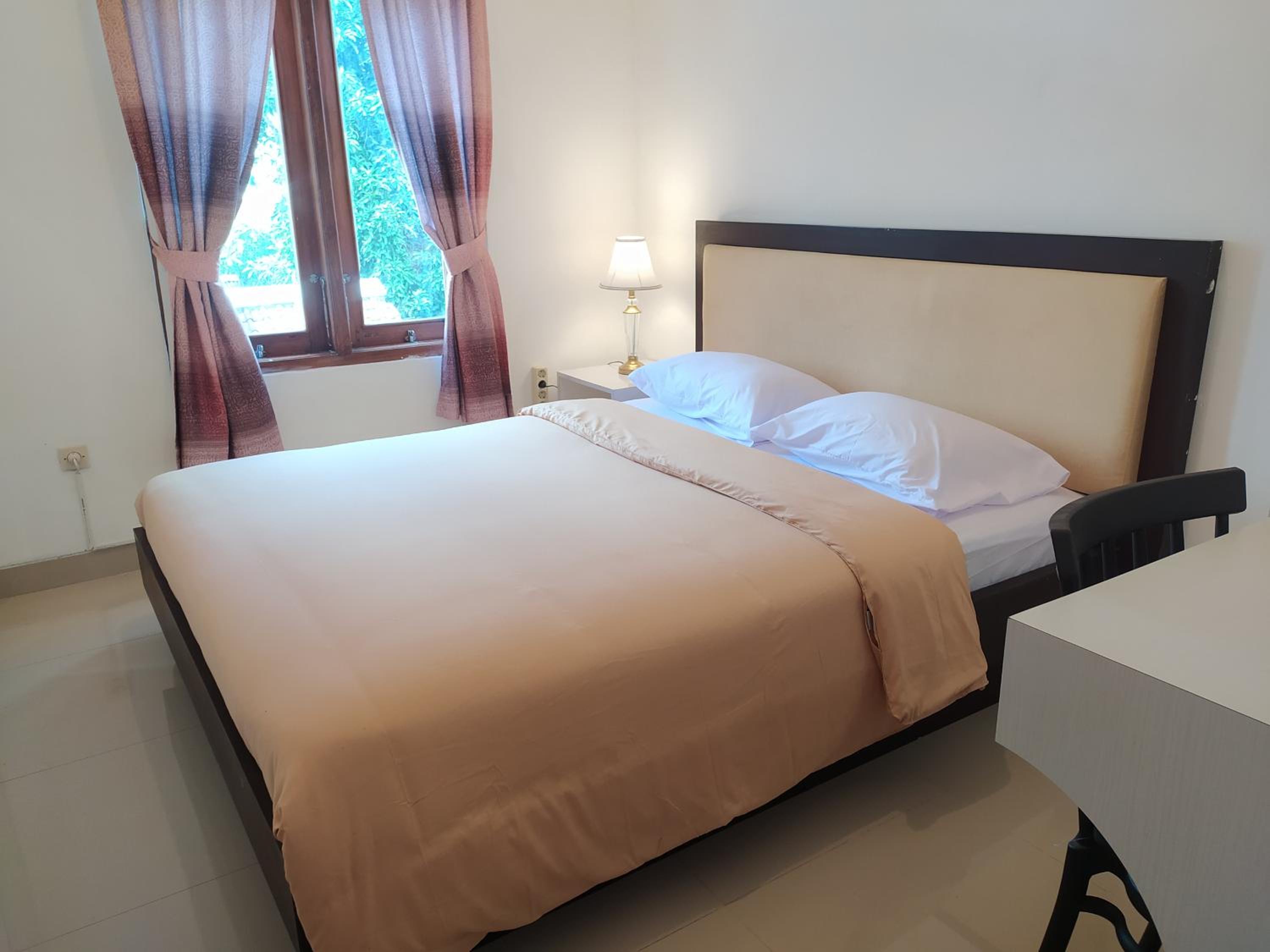 Four-Bedroom House - Photo 4