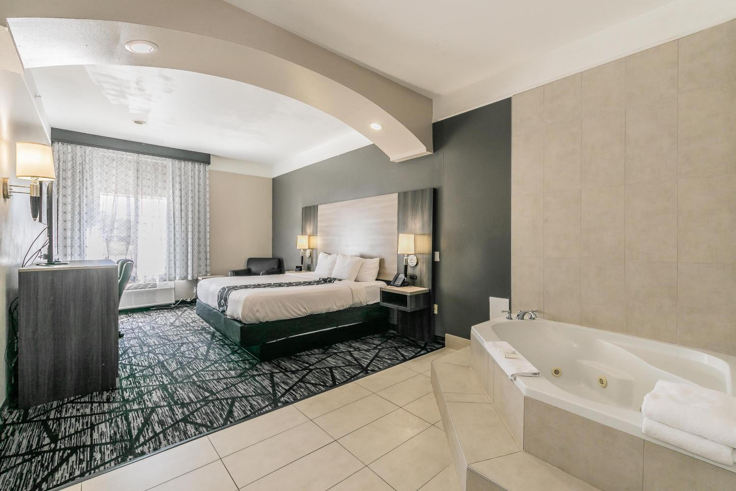 Deluxe King Suite with Roll-In Shower - Mobility Accessible/Non-Smoking photo 1