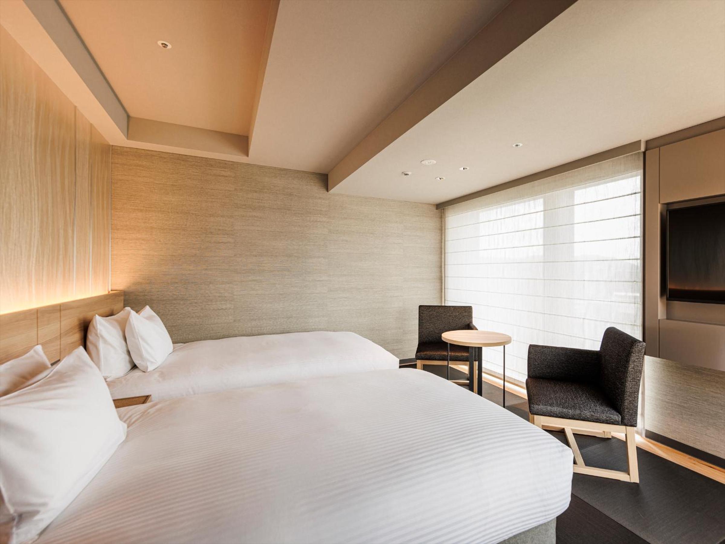 Deluxe Twin Room (2 Adults) - Photo 7