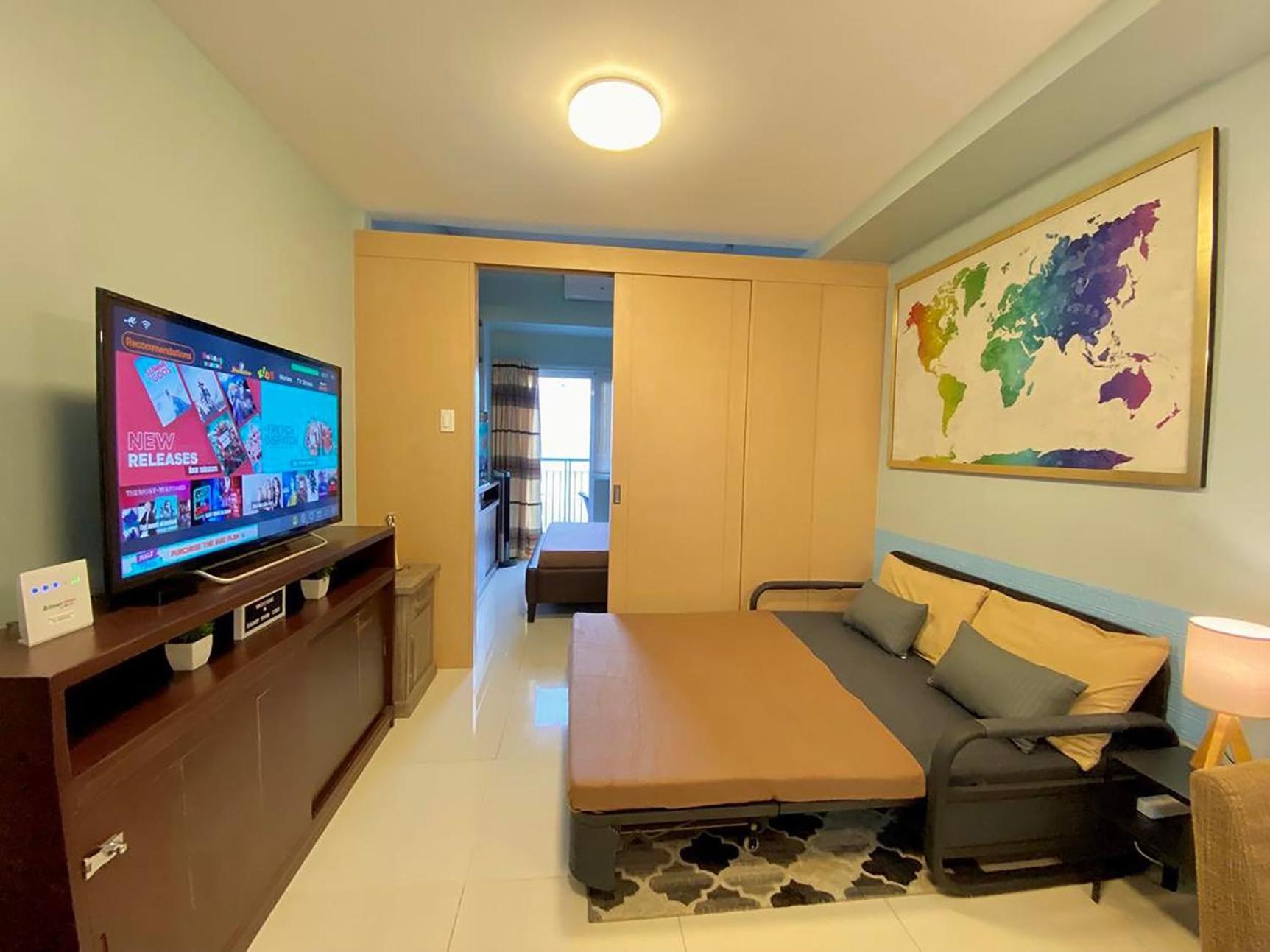 Family Room with Balcony - Photo 1