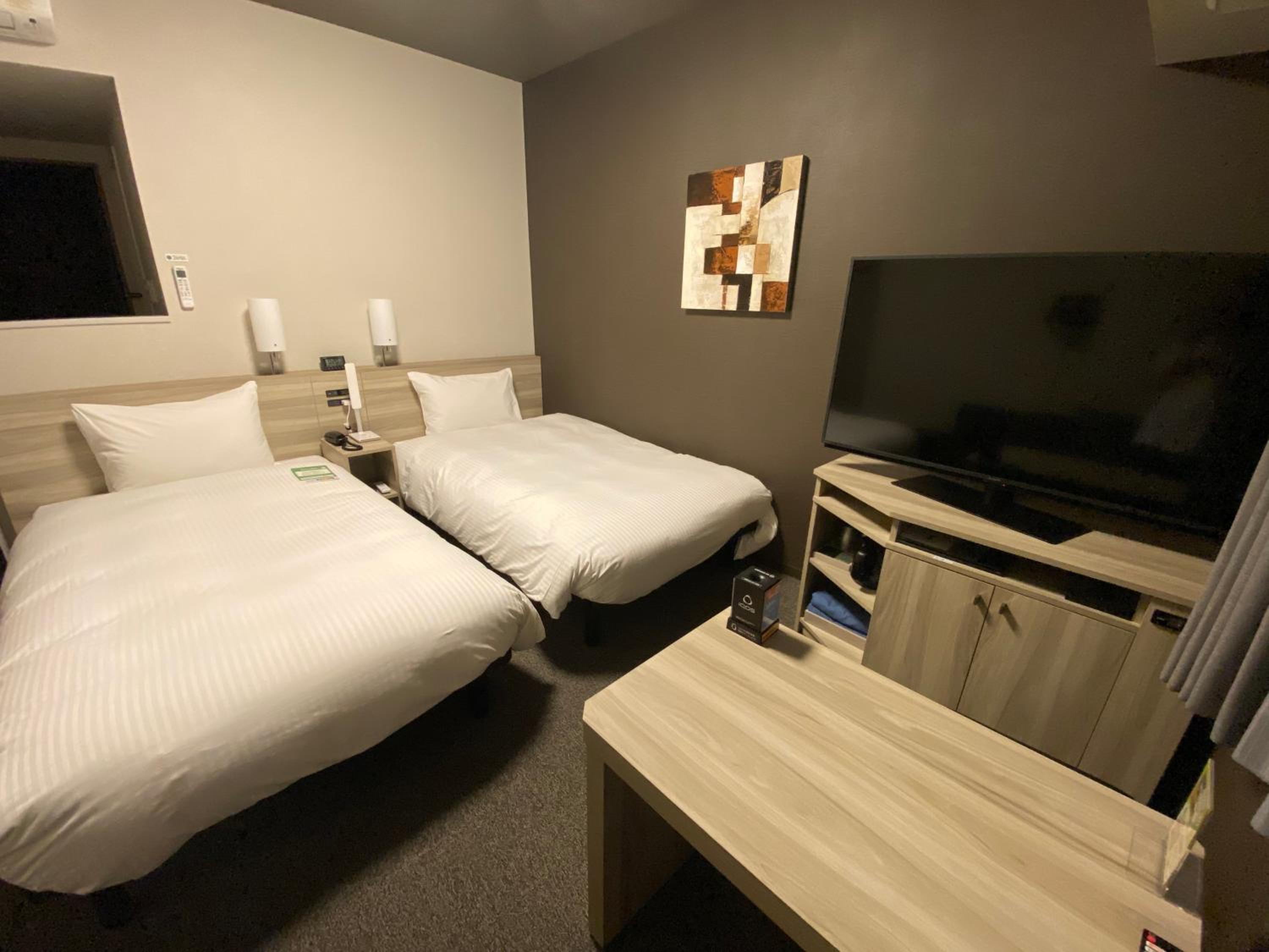 Twin Room - Non-Smoking - Photo 1