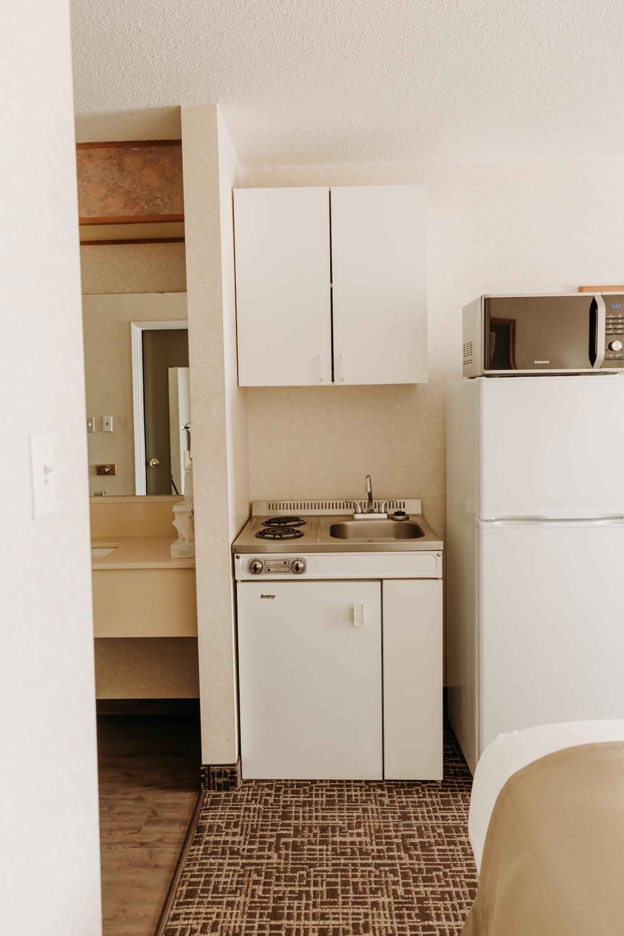 Deluxe Quadruple Room - Photo 6