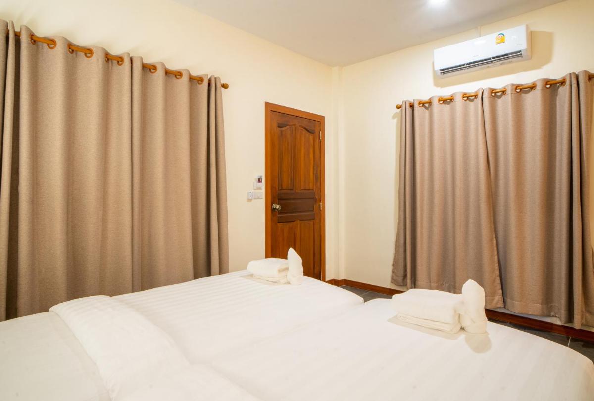 Standard Bungalow Twin Bed - Photo 1