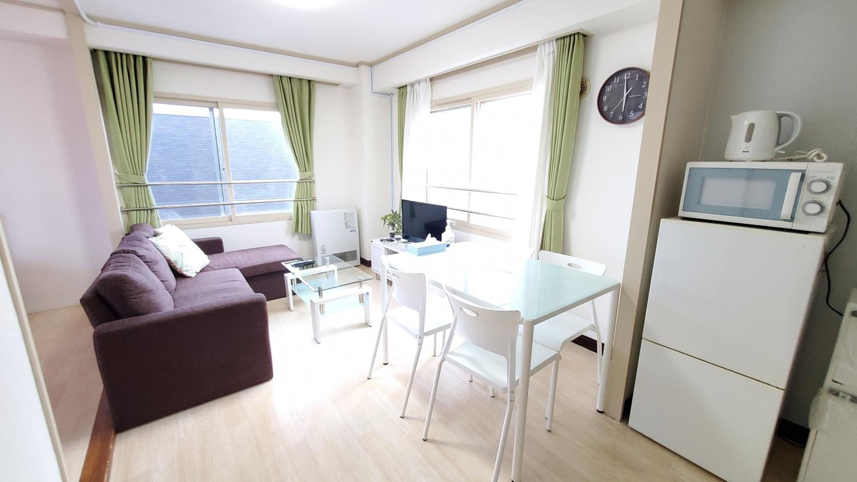 Three-Bedroom Apartment - Photo 26