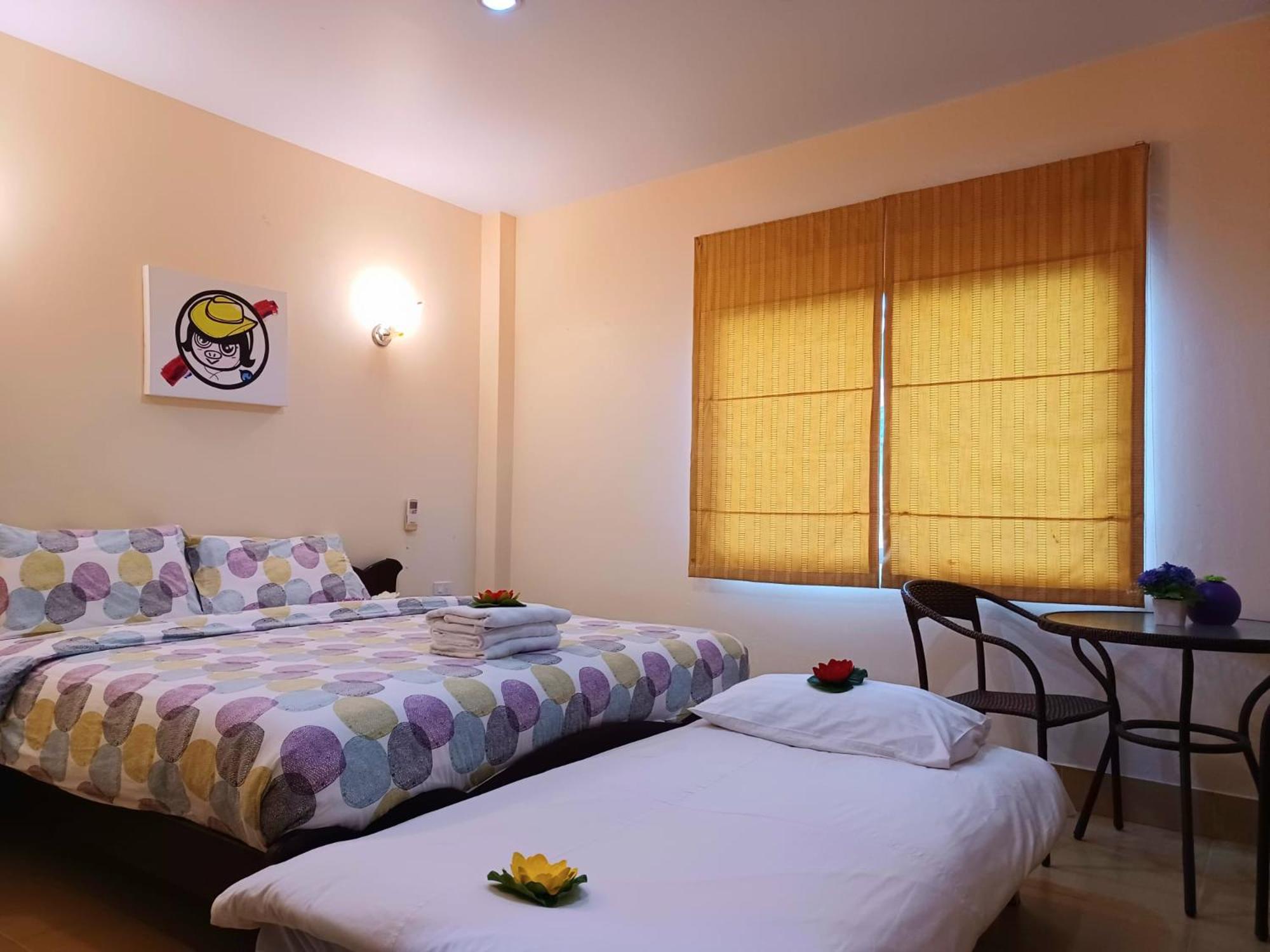 Deluxe Triple Room - Photo 1