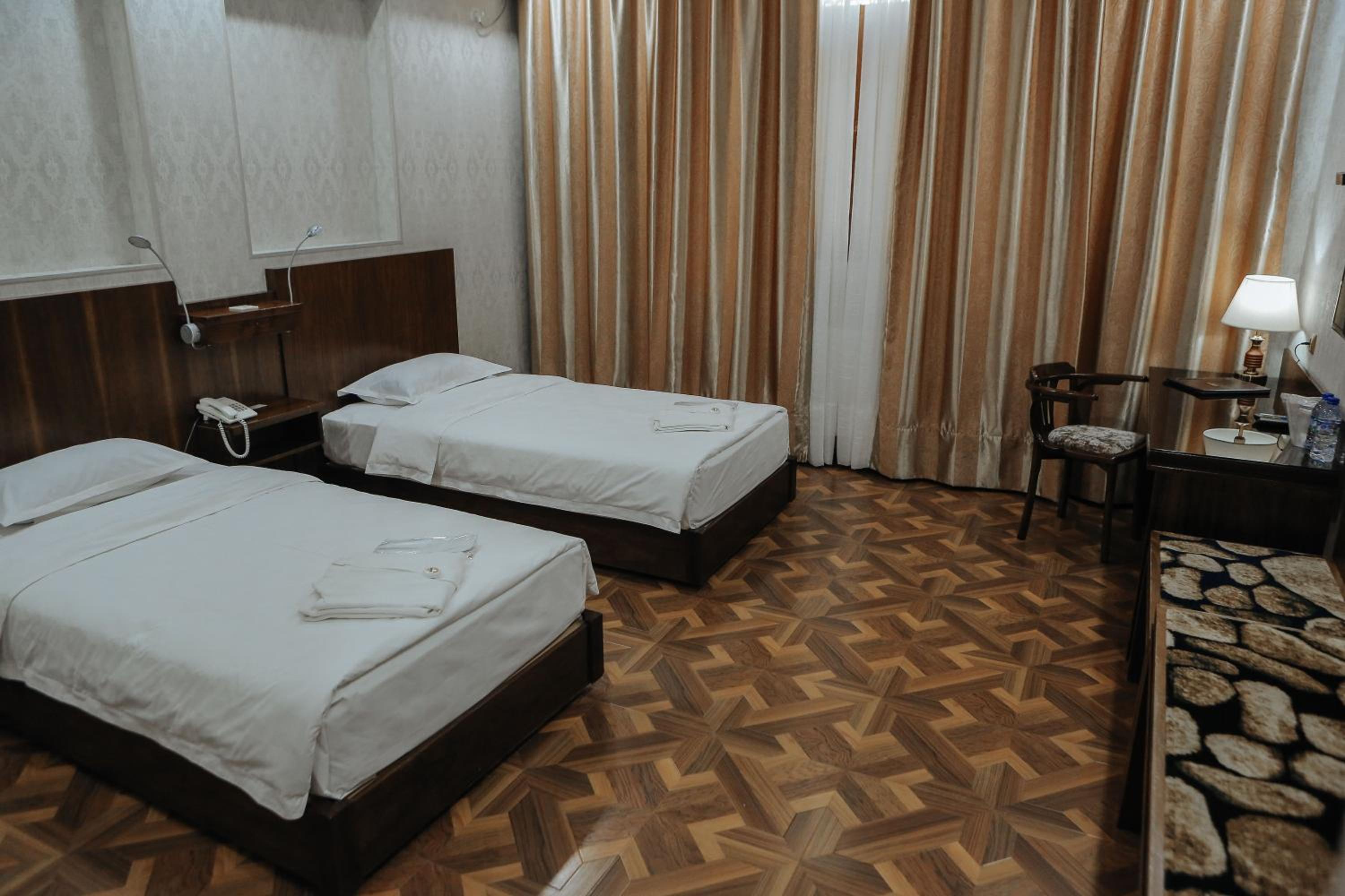 Deluxe Queen Room with Two Queen Beds photo 1