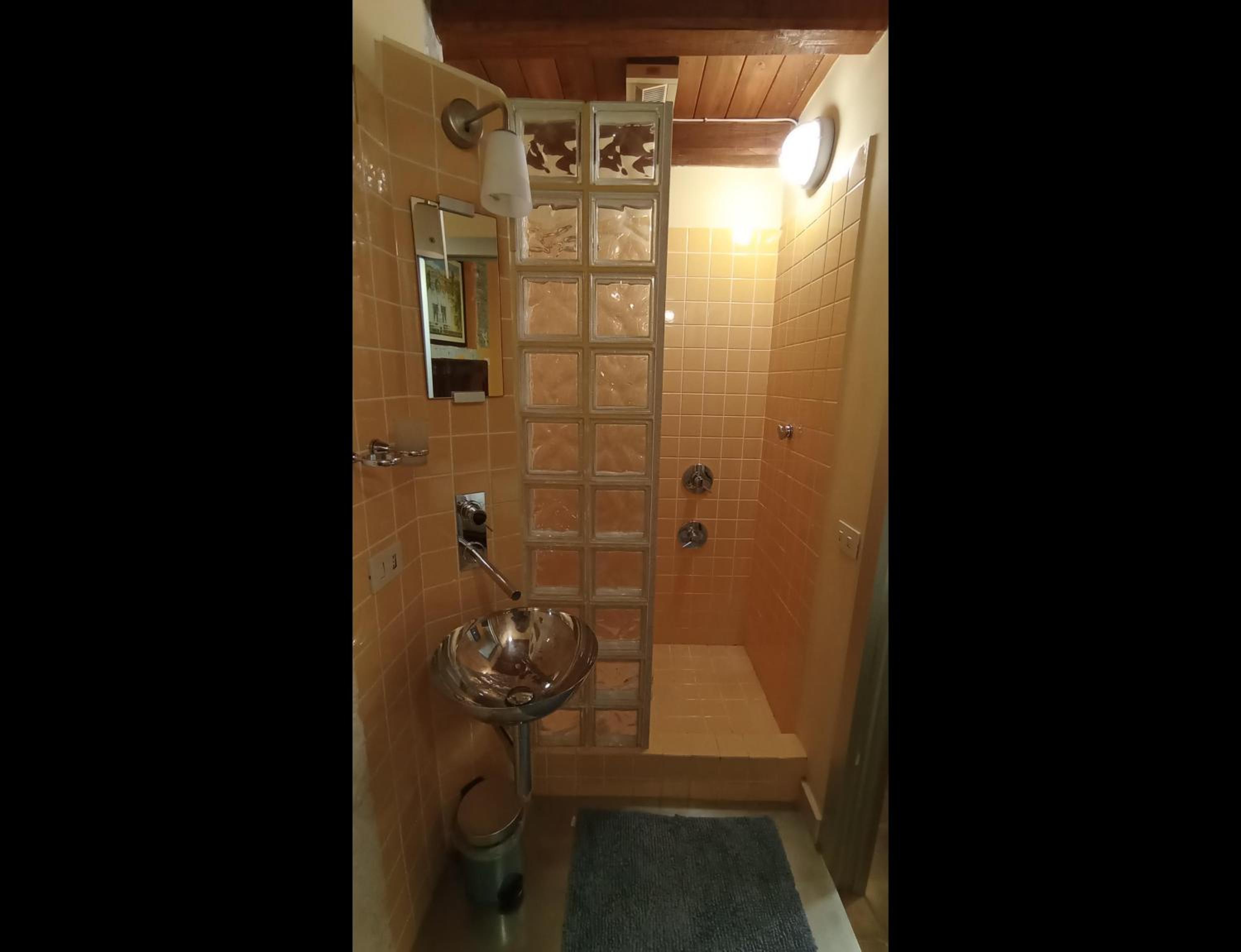 Three-Bedroom House - Photo 23