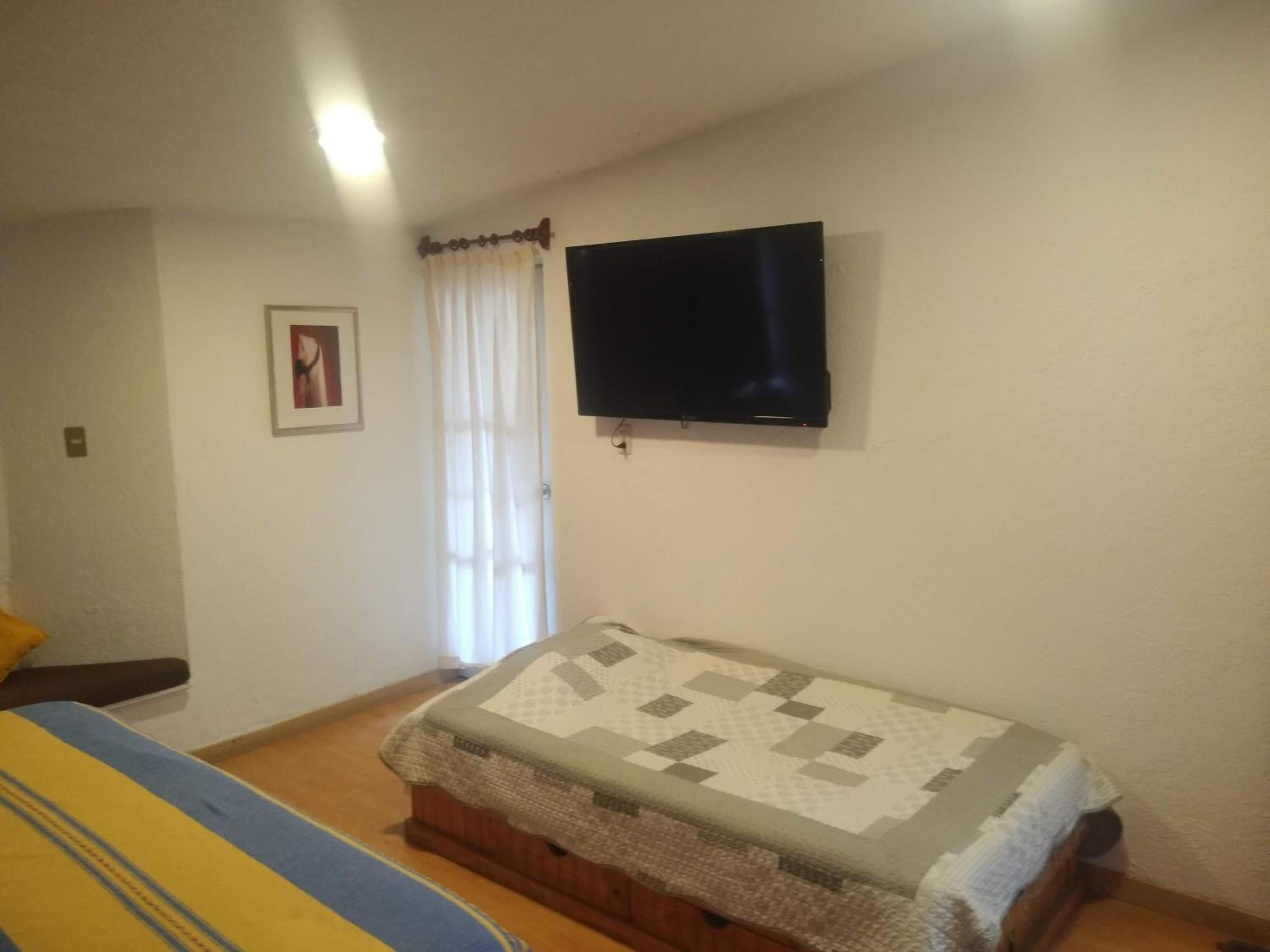 Three-Bedroom Apartment photo 1
