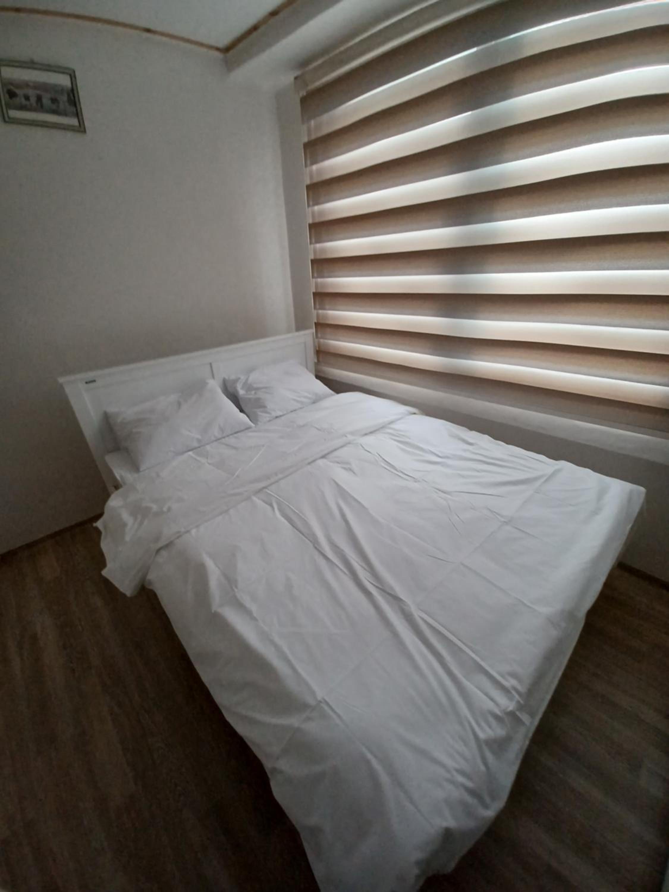 Three-Bedroom Townhouse - Photo 2