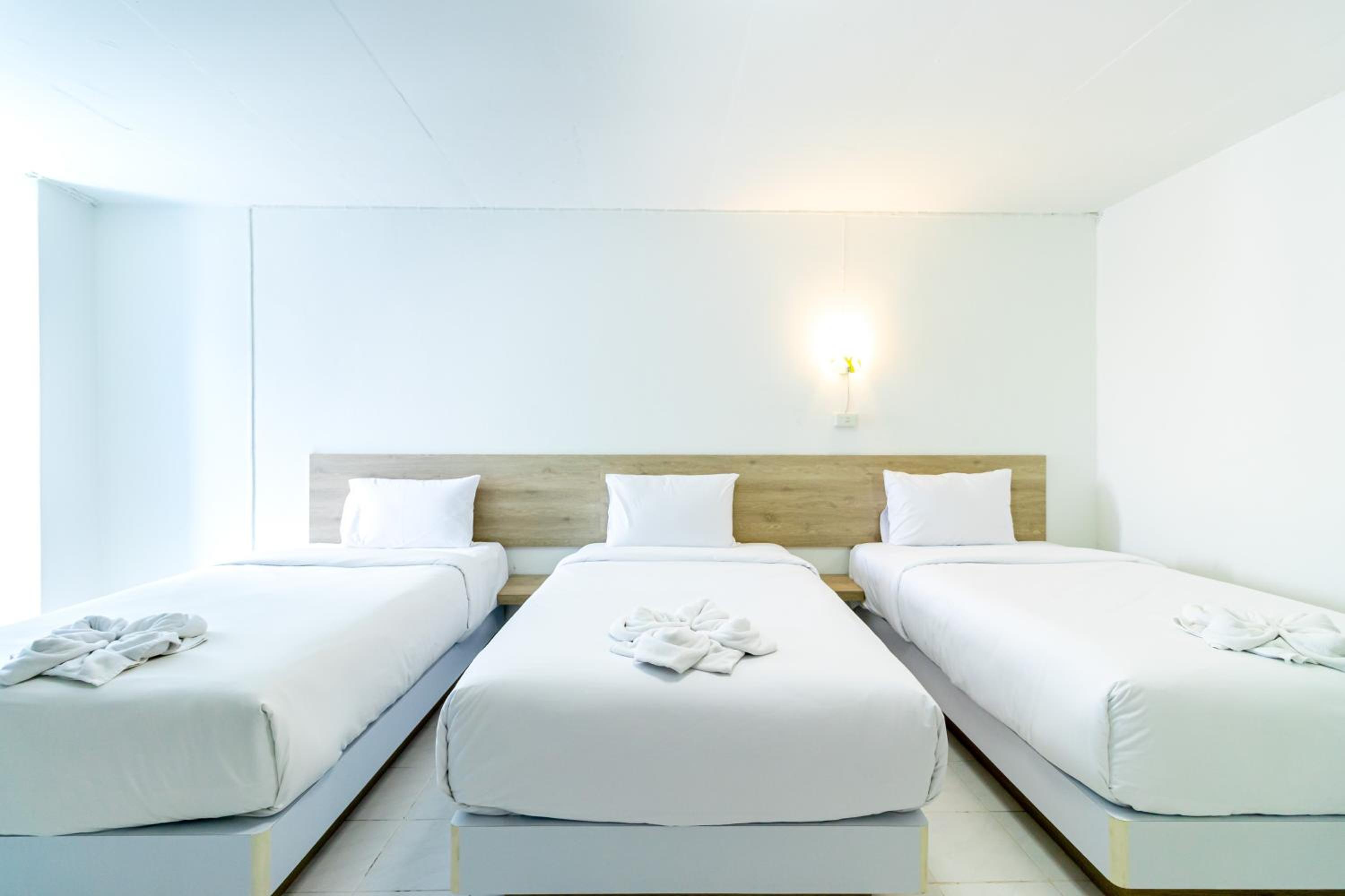 Deluxe Triple Room - Photo 8