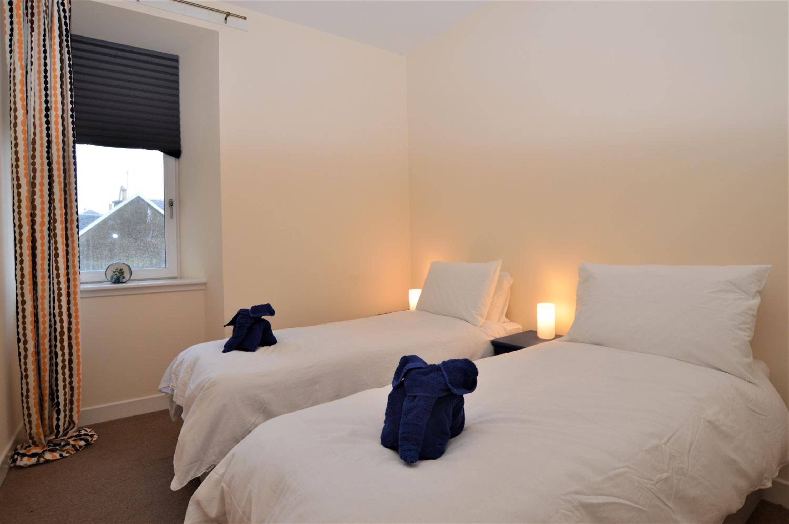 Three-Bedroom Apartment photo 1