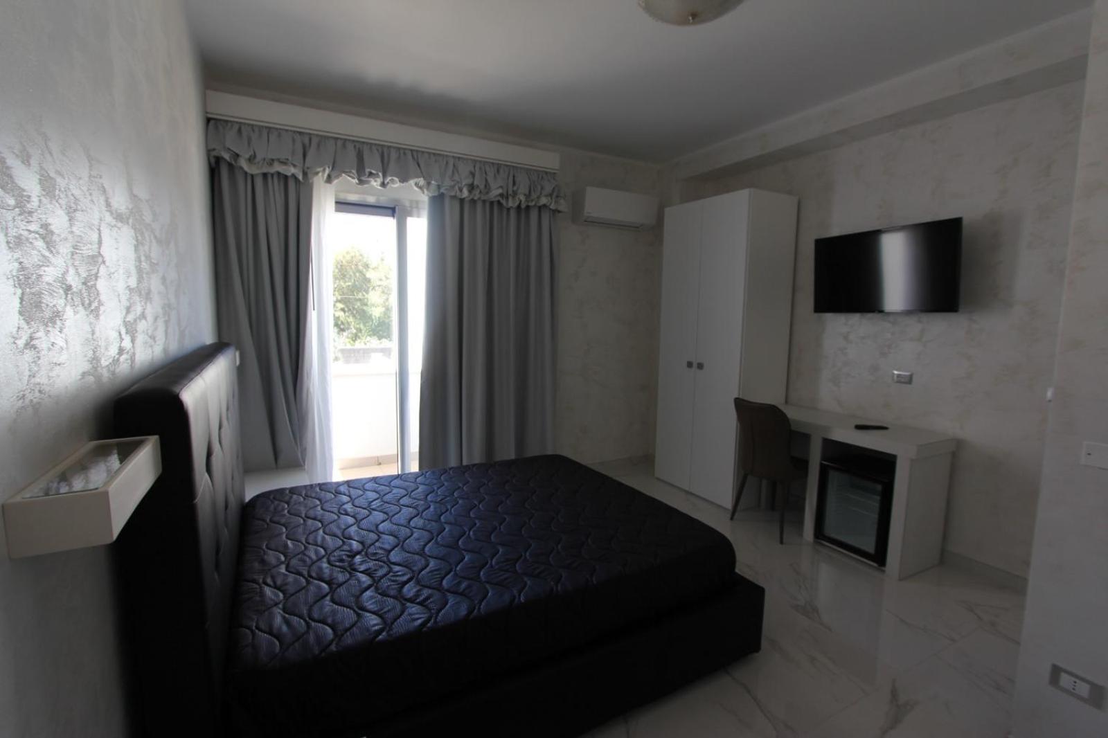 Deluxe Room - Photo 4