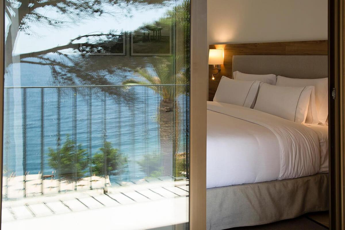Habitación Doble o con Dos Camas con Cama Extra y Vista al Mar