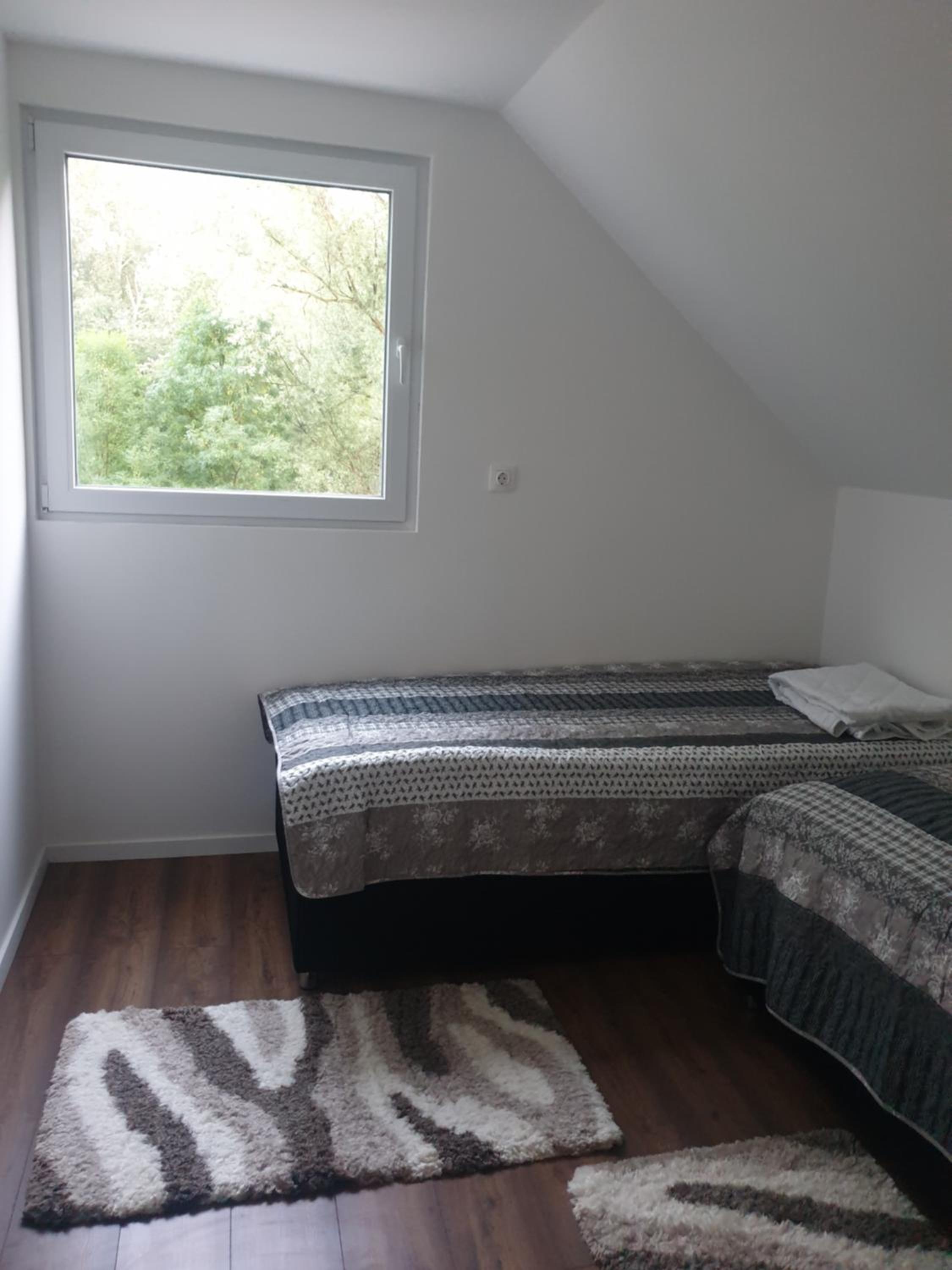 Three-Bedroom House - Photo 3