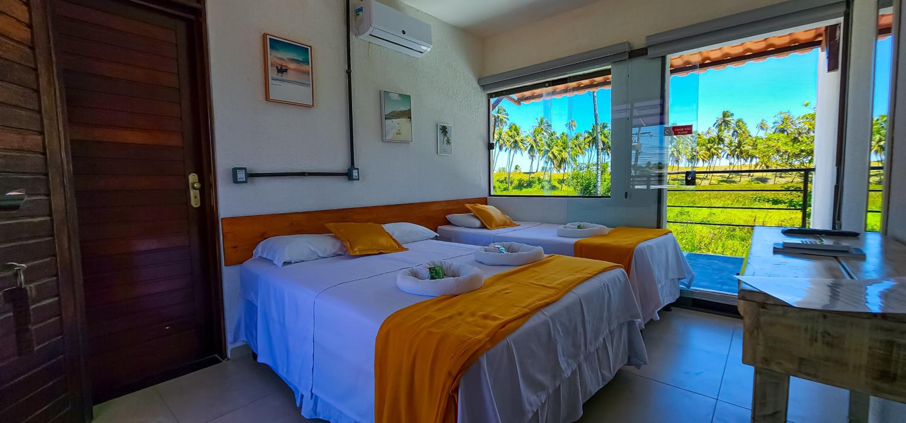 Deluxe Triple Room - Photo 12