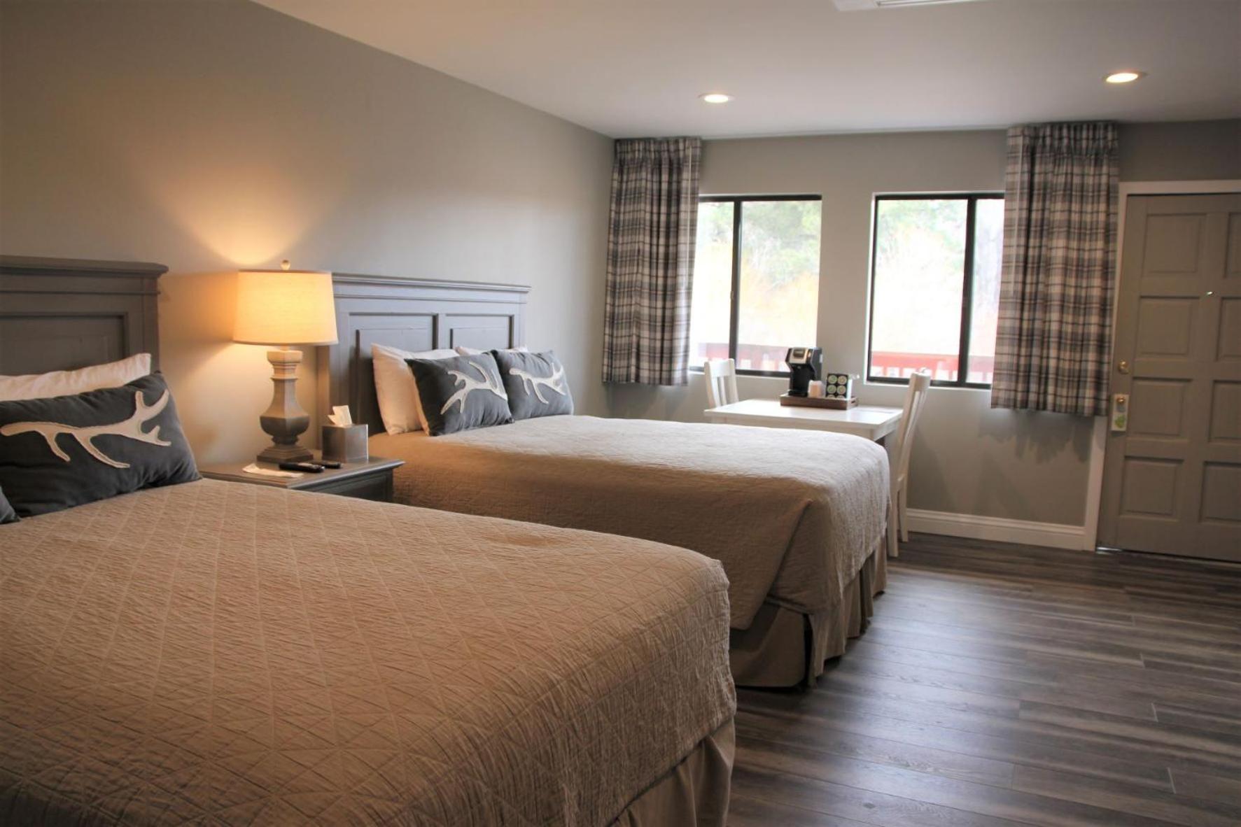 Queen Motel Room with Two Queen Beds - Photo 1