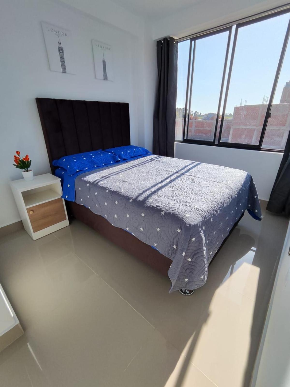 Three-Bedroom Apartment photo 1