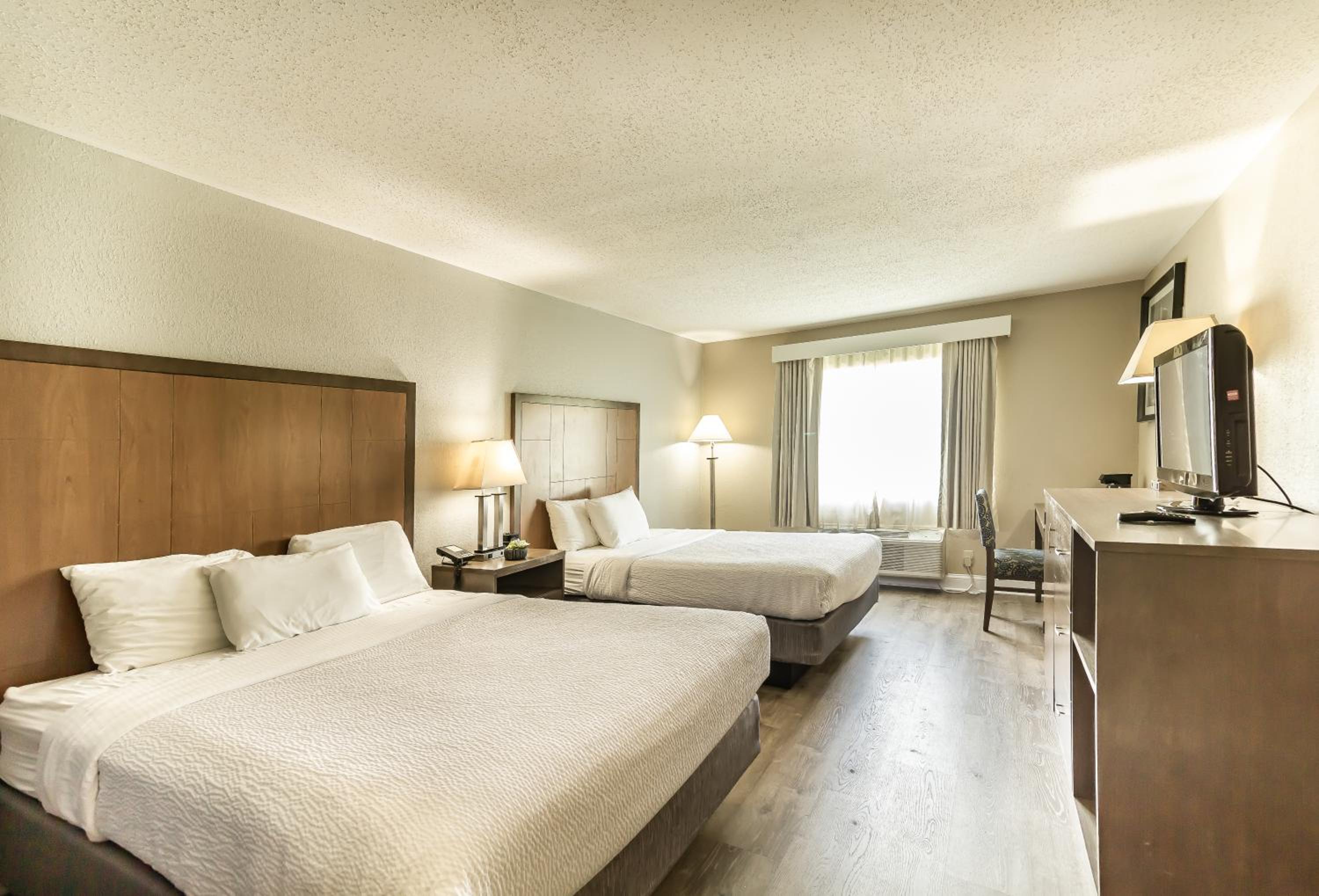 Queen Room with Two Queen Beds - Non-Smoking - Photo 1