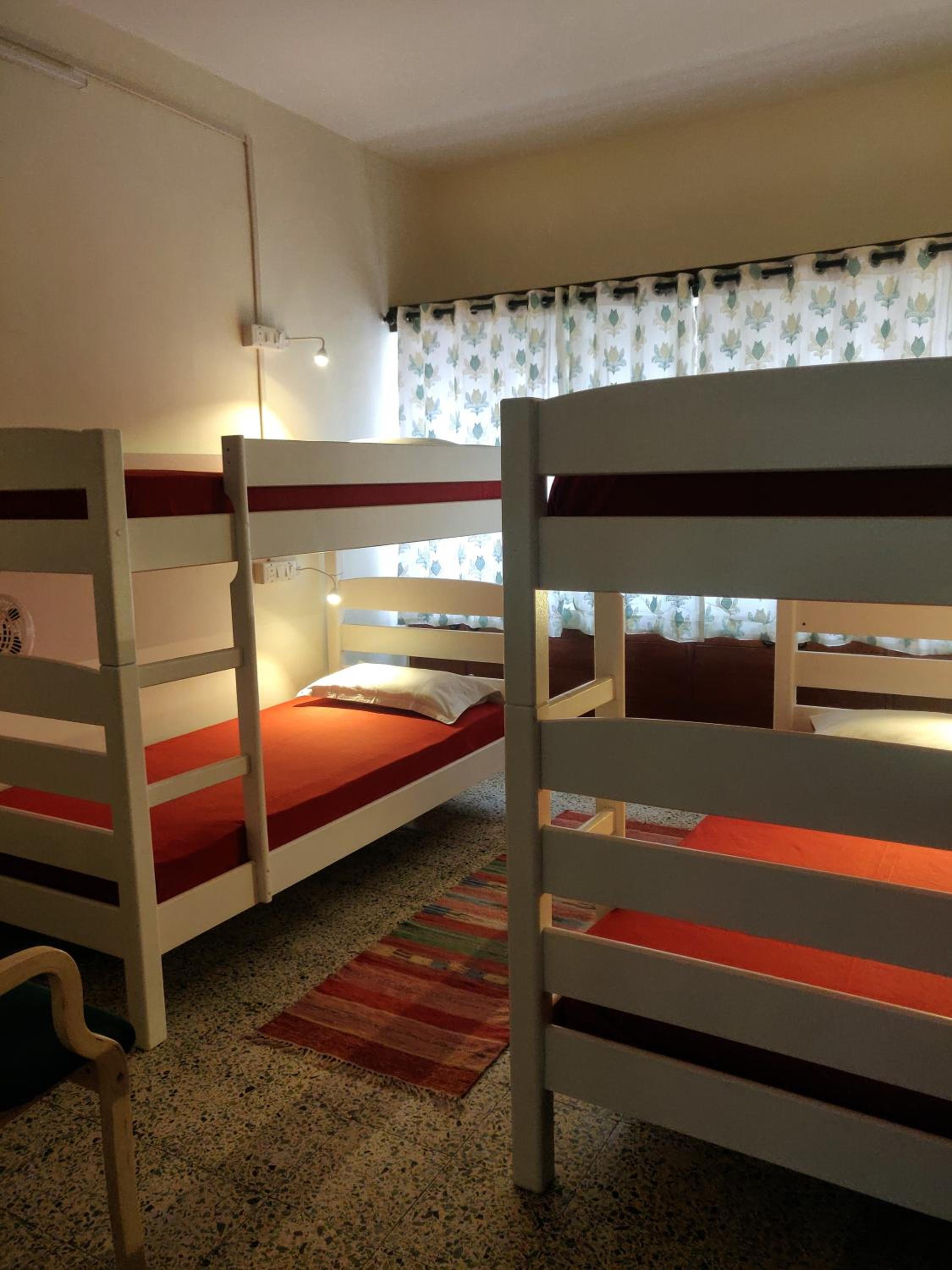 Single Bed in Dormitory Room